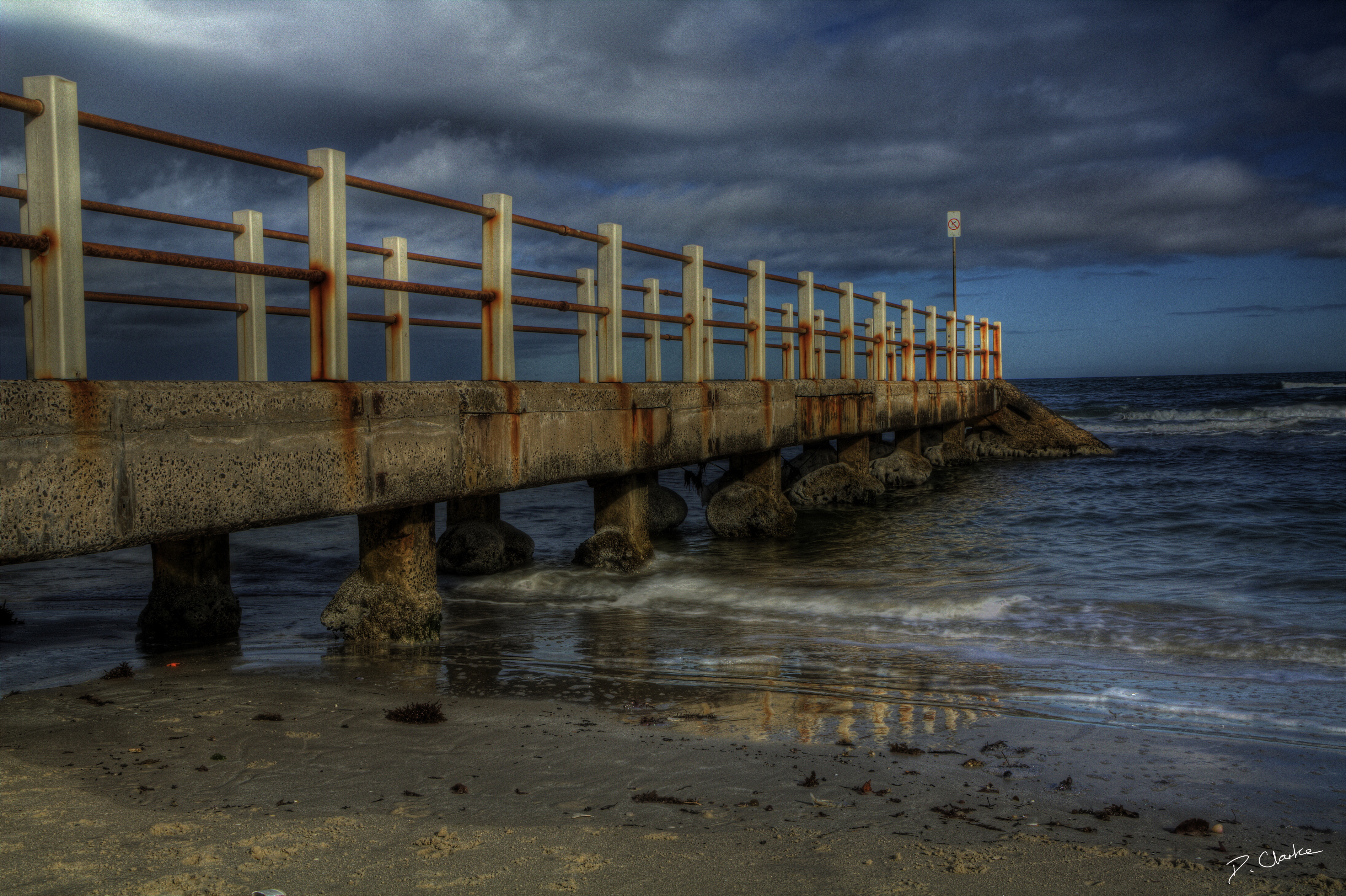The gloomy pier at dusk.