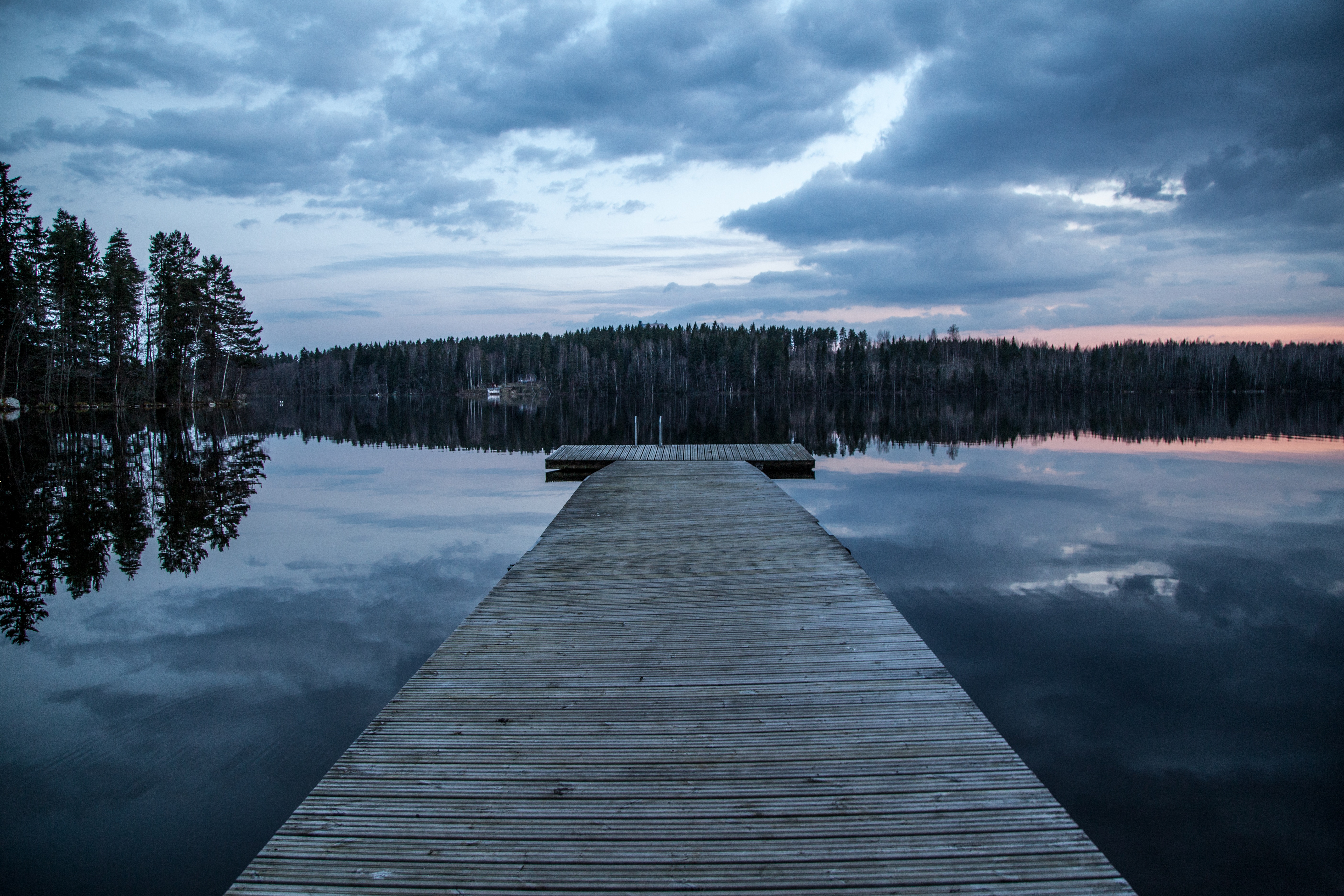 Free photo Wallpaper with a wide wooden bridge on the water