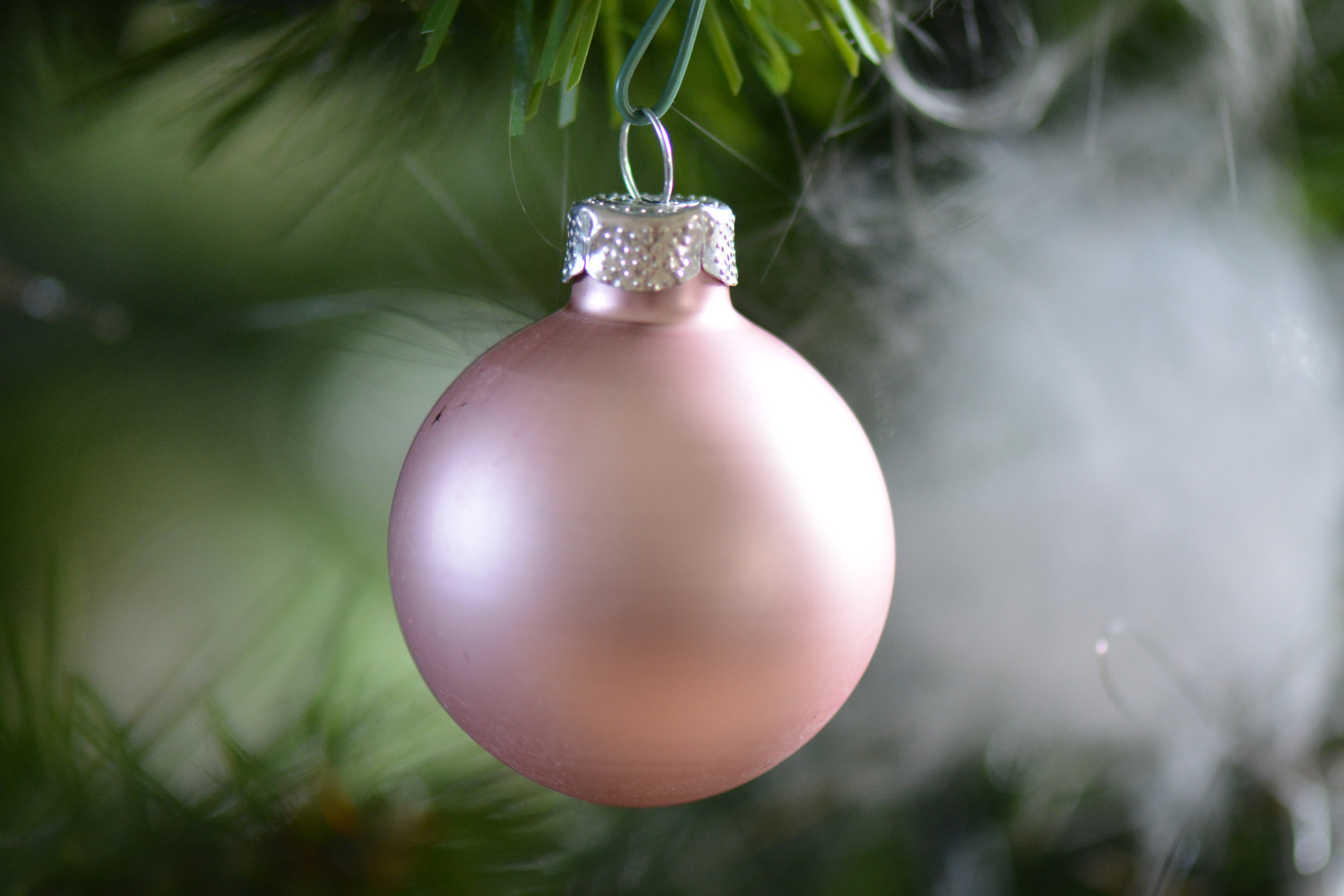 A pink-colored New Year`s Eve balloon