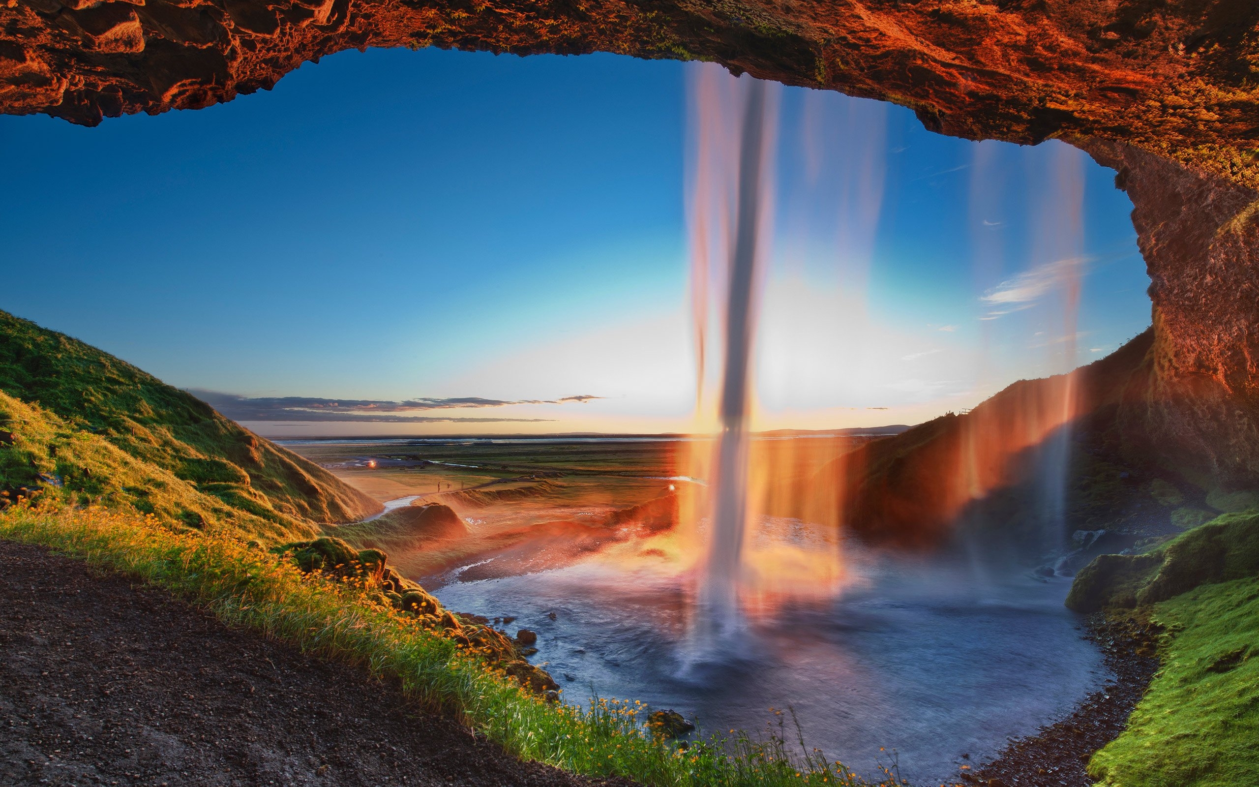 Free photo Waterfall at sunset