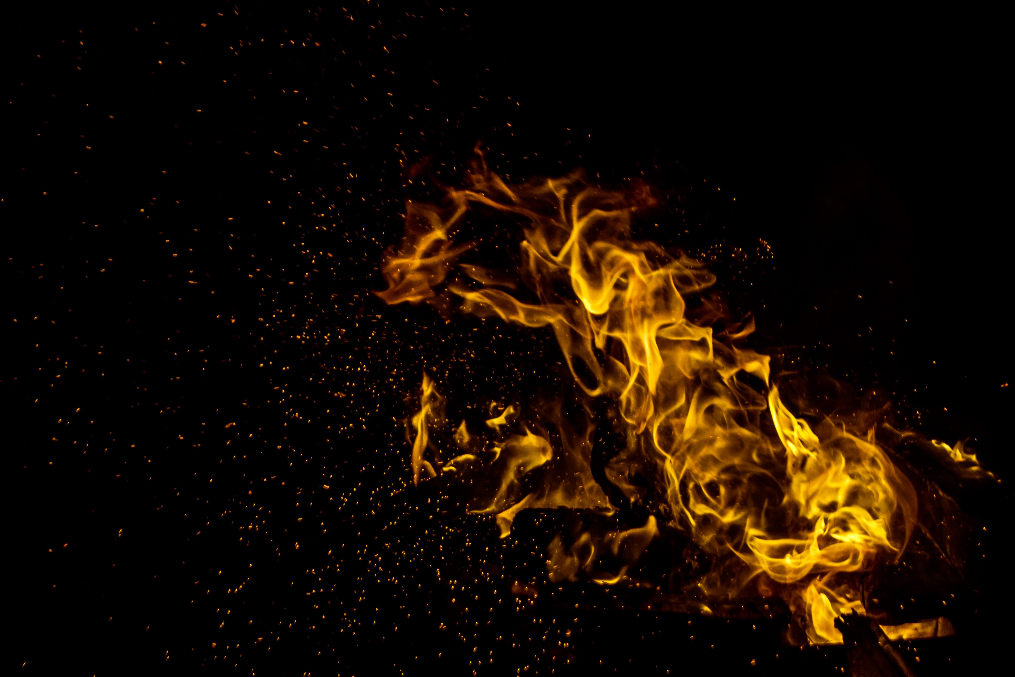 A picture of flames in the dark.