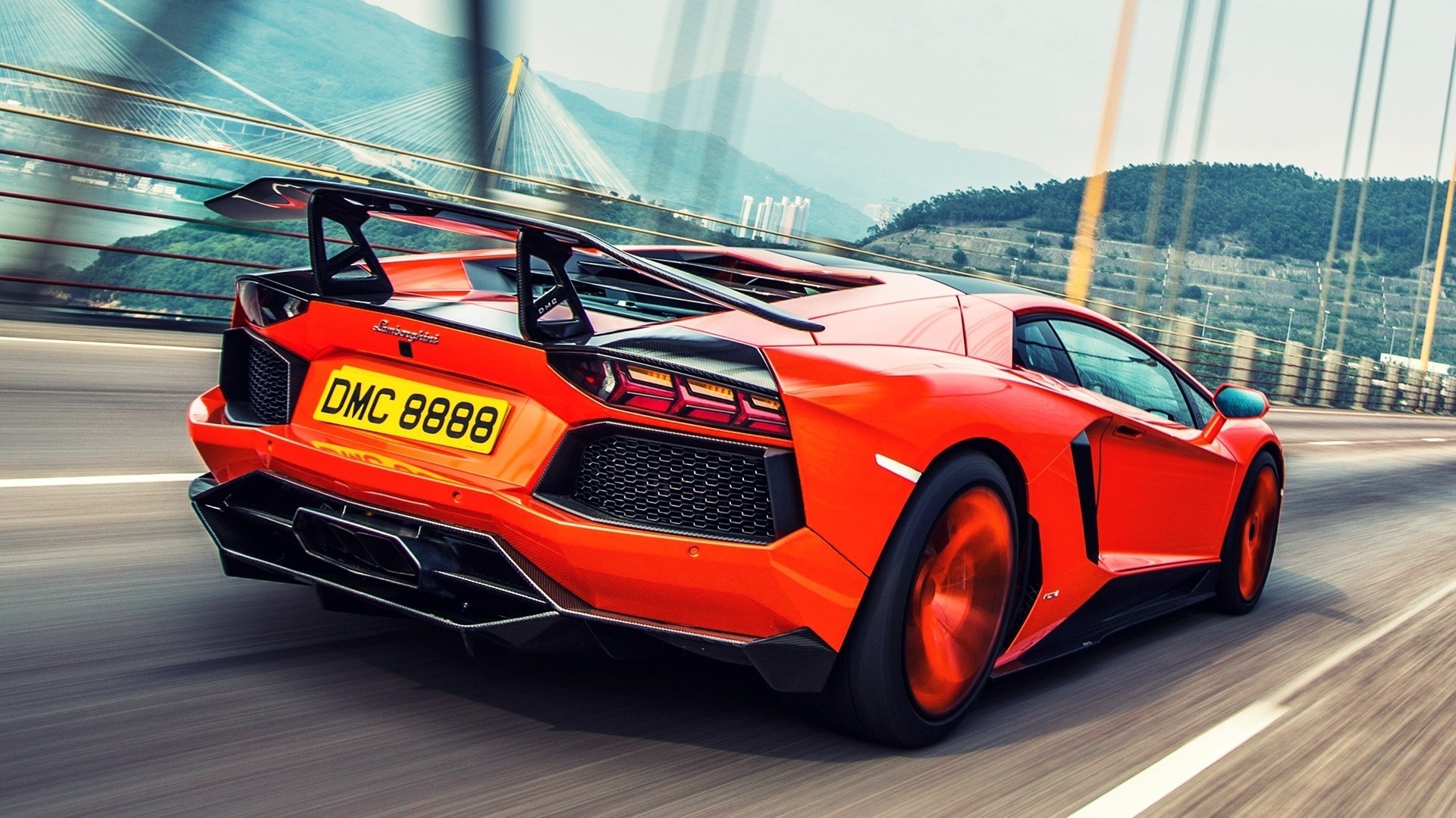 Free photo Lamborghini Aventador in orange rear view