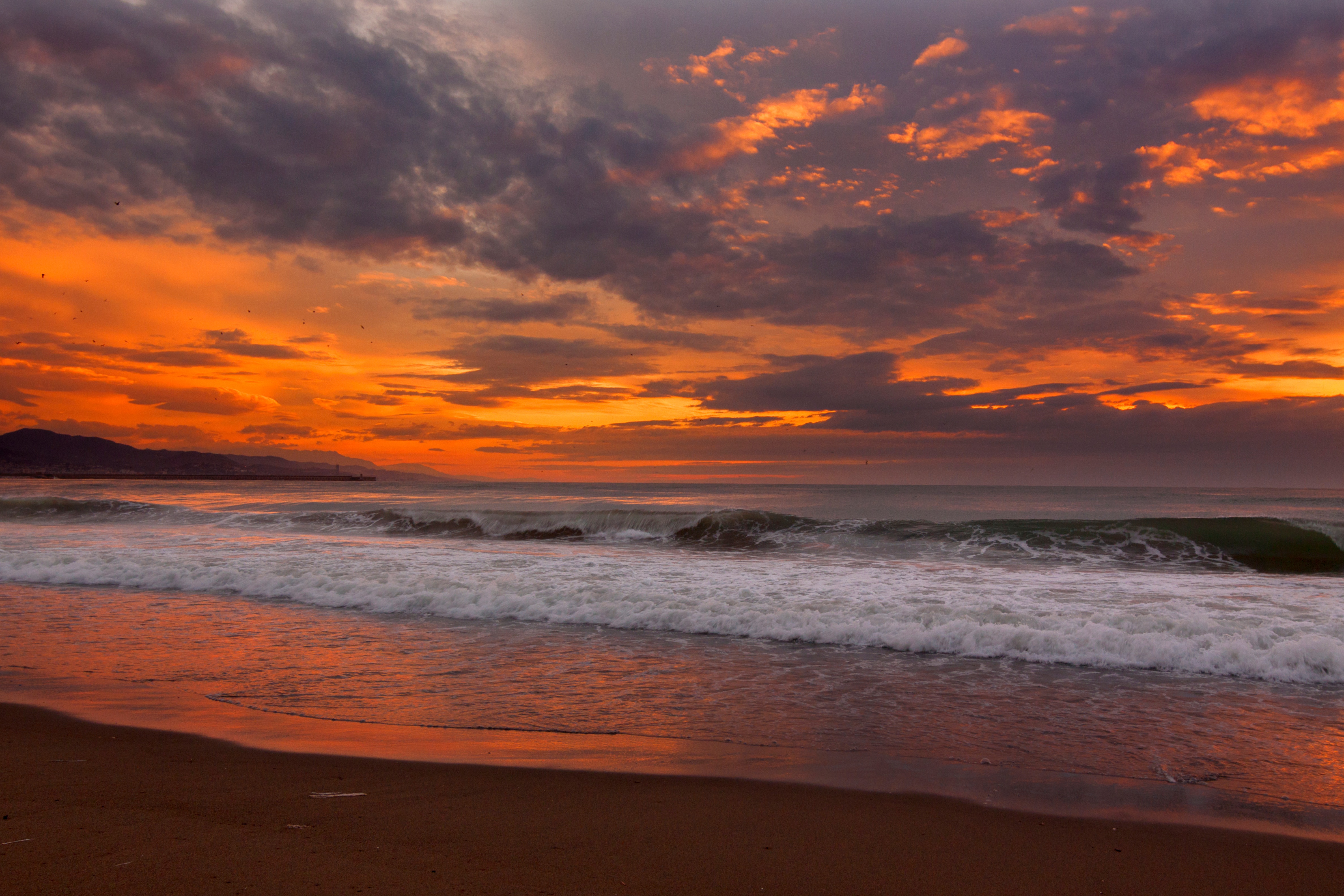 免费照片海边火红的夕阳