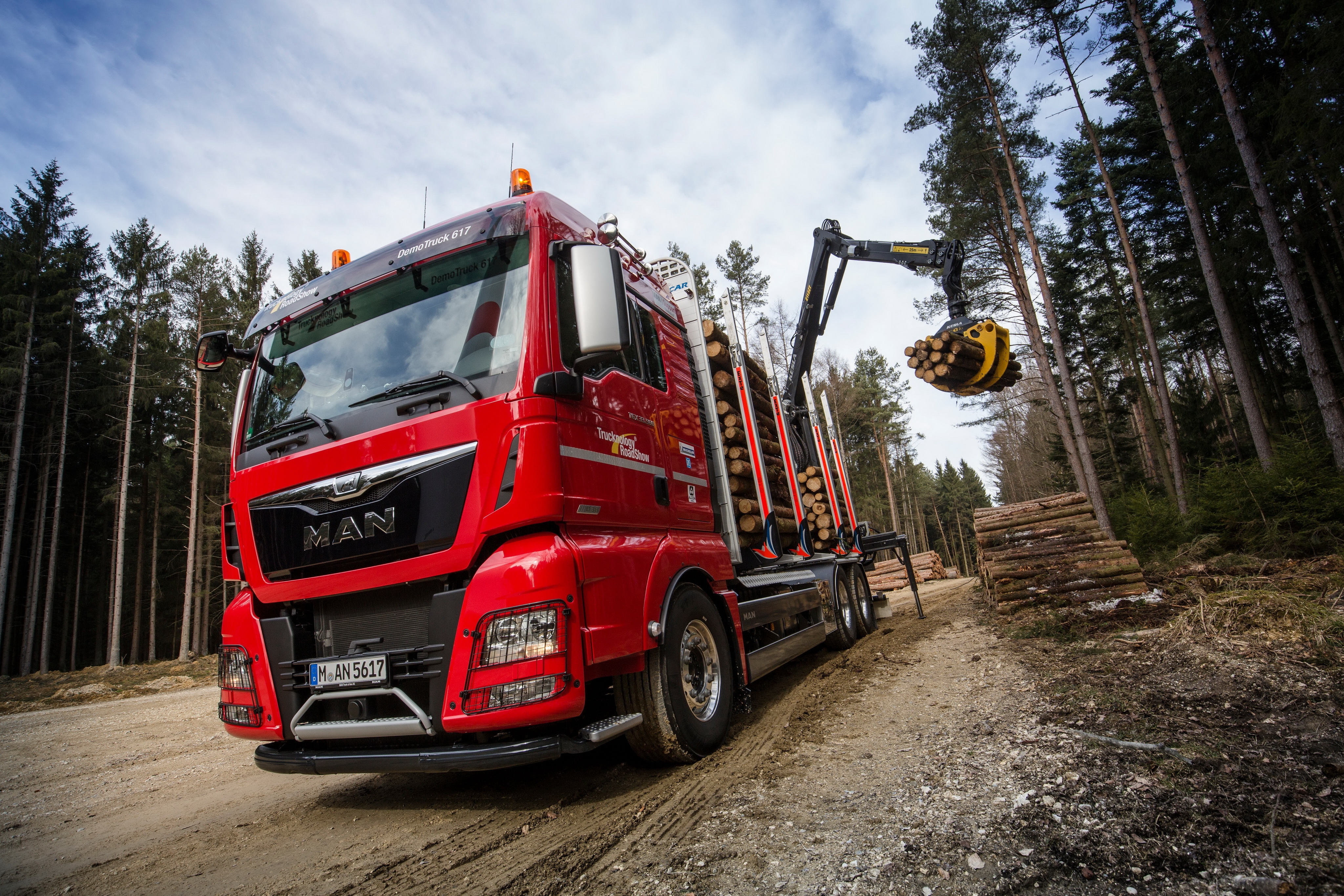 Free photo Red MAN logging truck