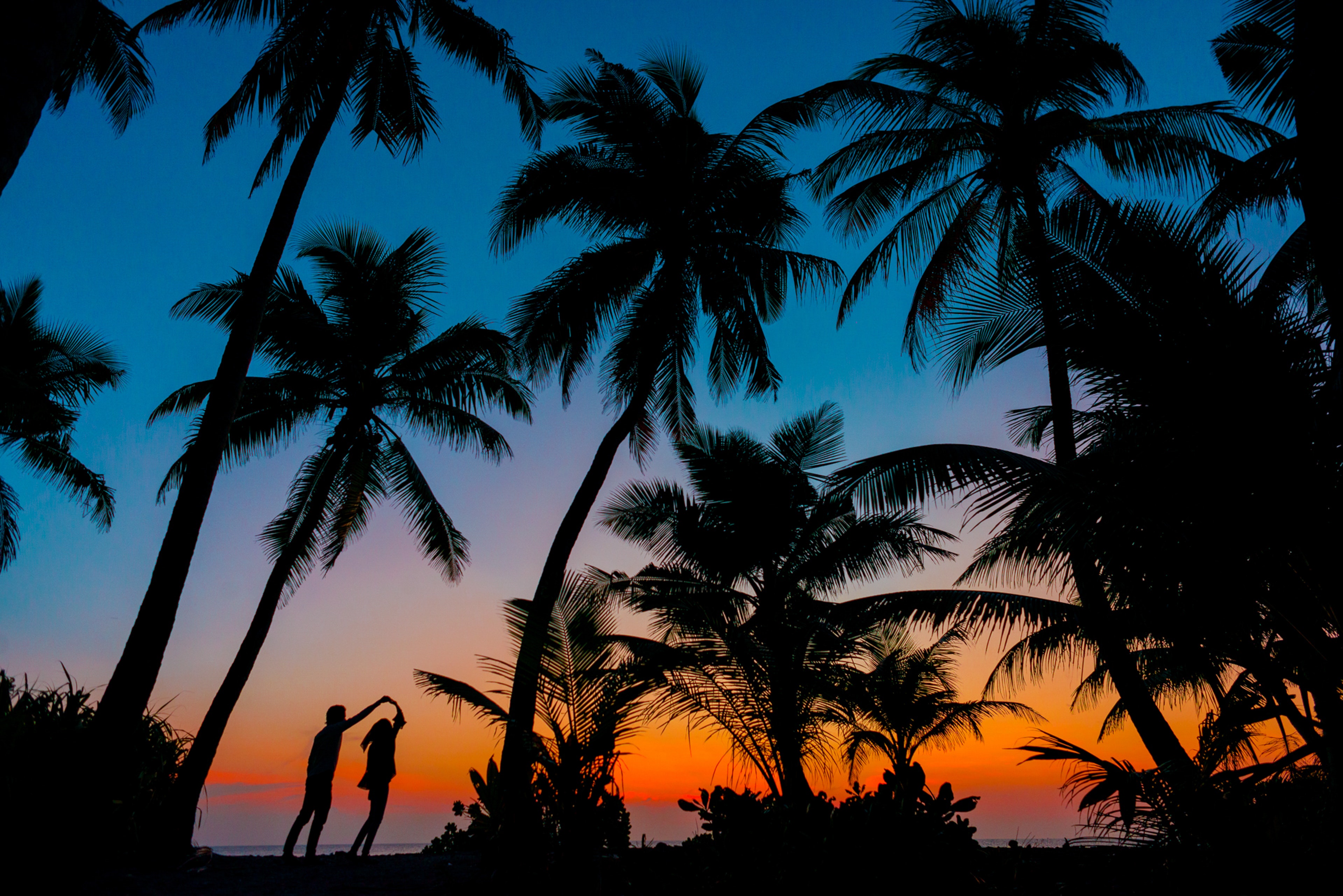 Wallpapers The Maldives sunrise couple on the desktop