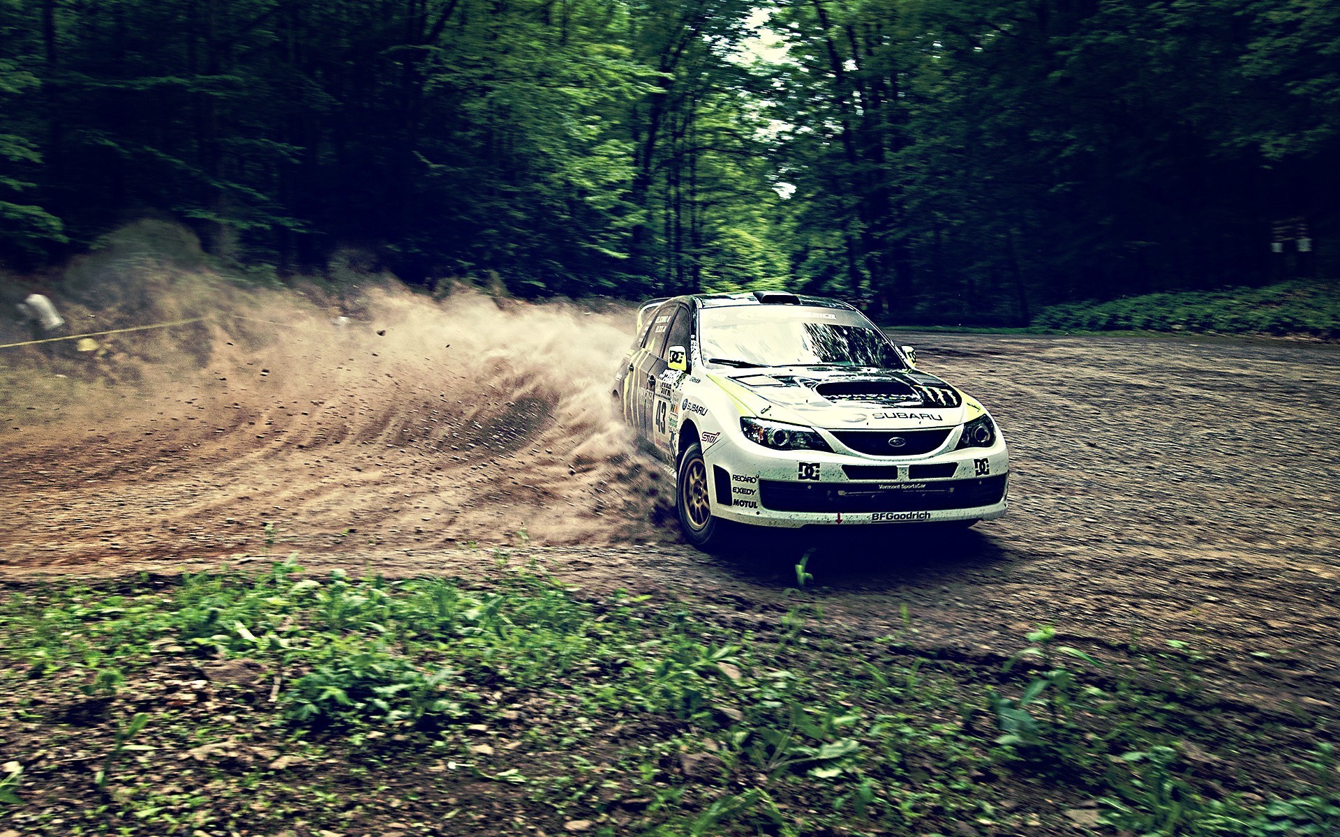 Sideways through the dust in a Subaru