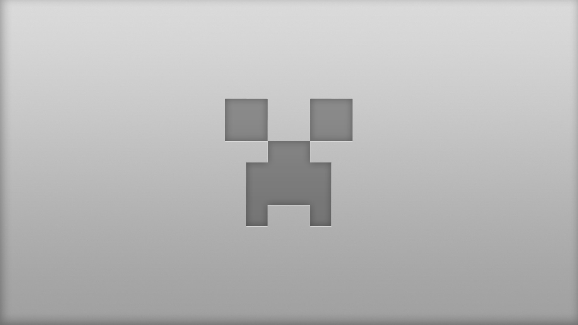 Арт по Minecraft, на изображении лицо, созданное из пиксельных геометрических форм.