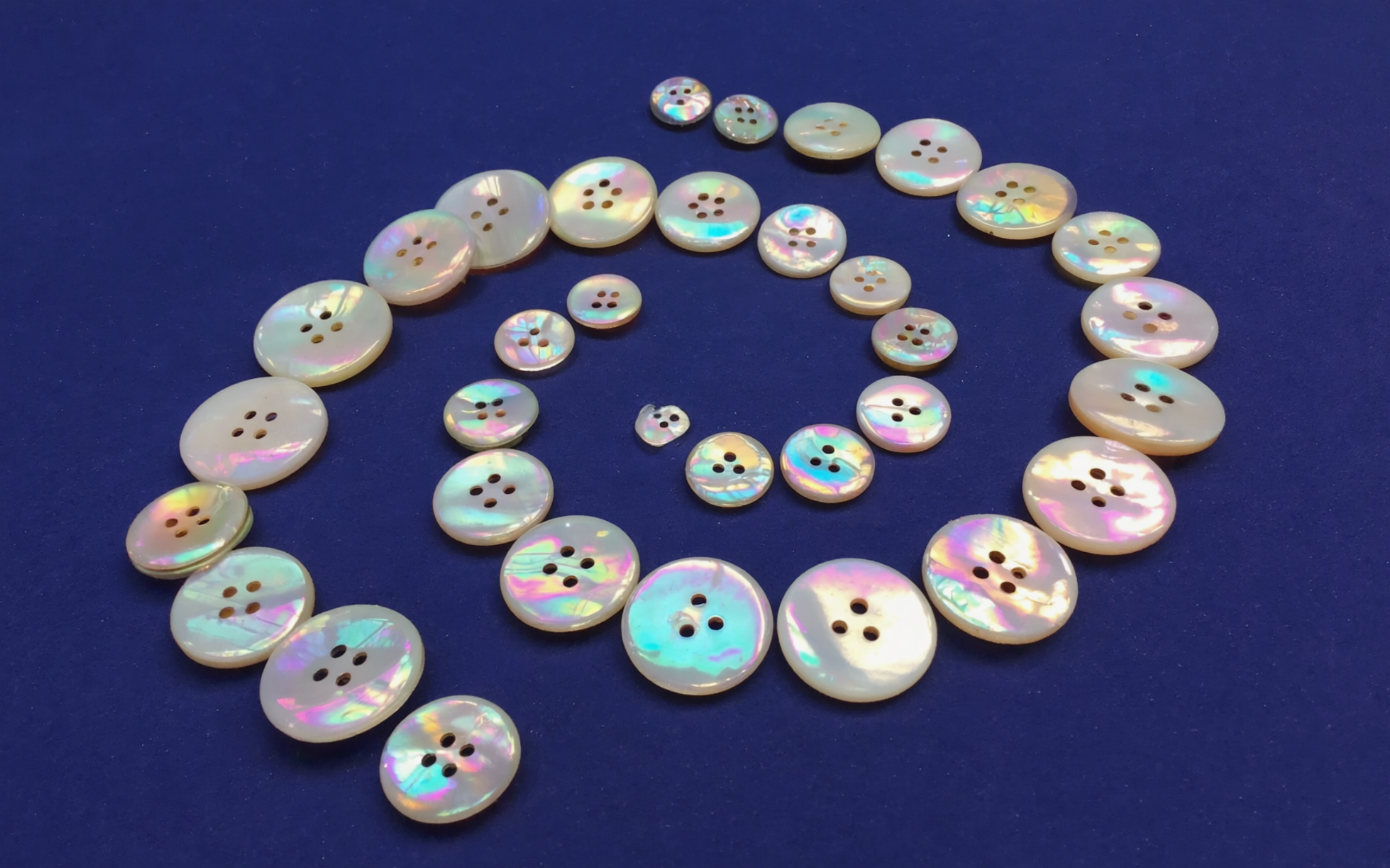 Abstract photo: buttons lined with spirals