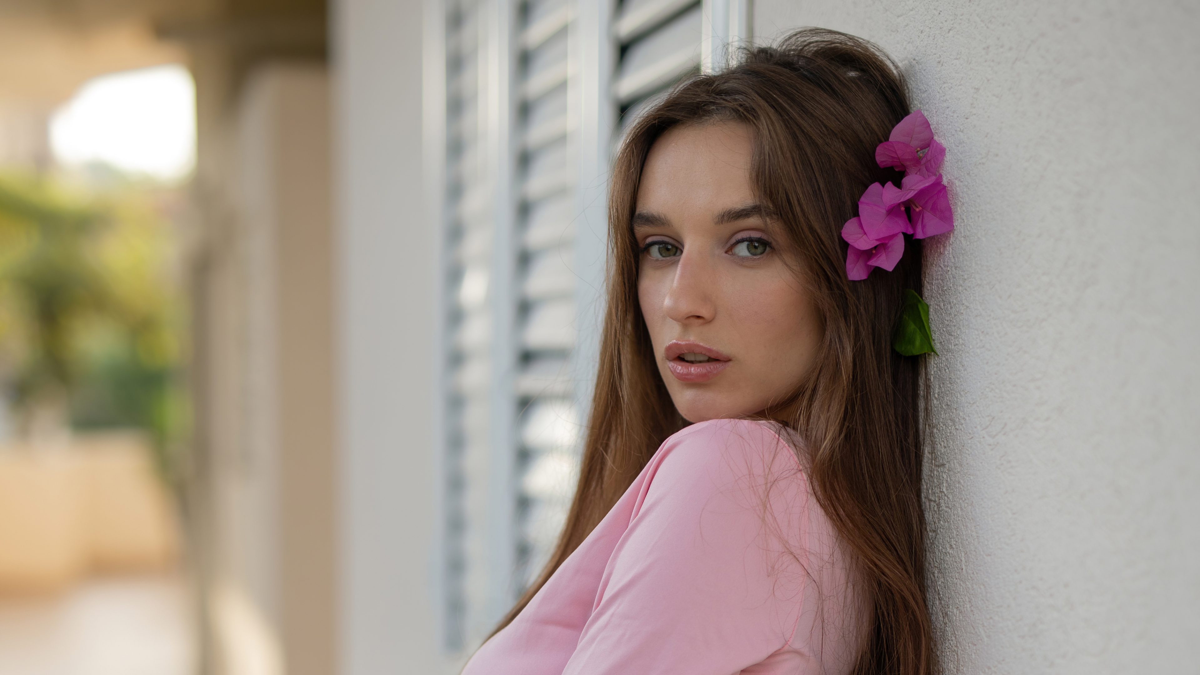 Free photo Gloria Sol with a flower in her hair