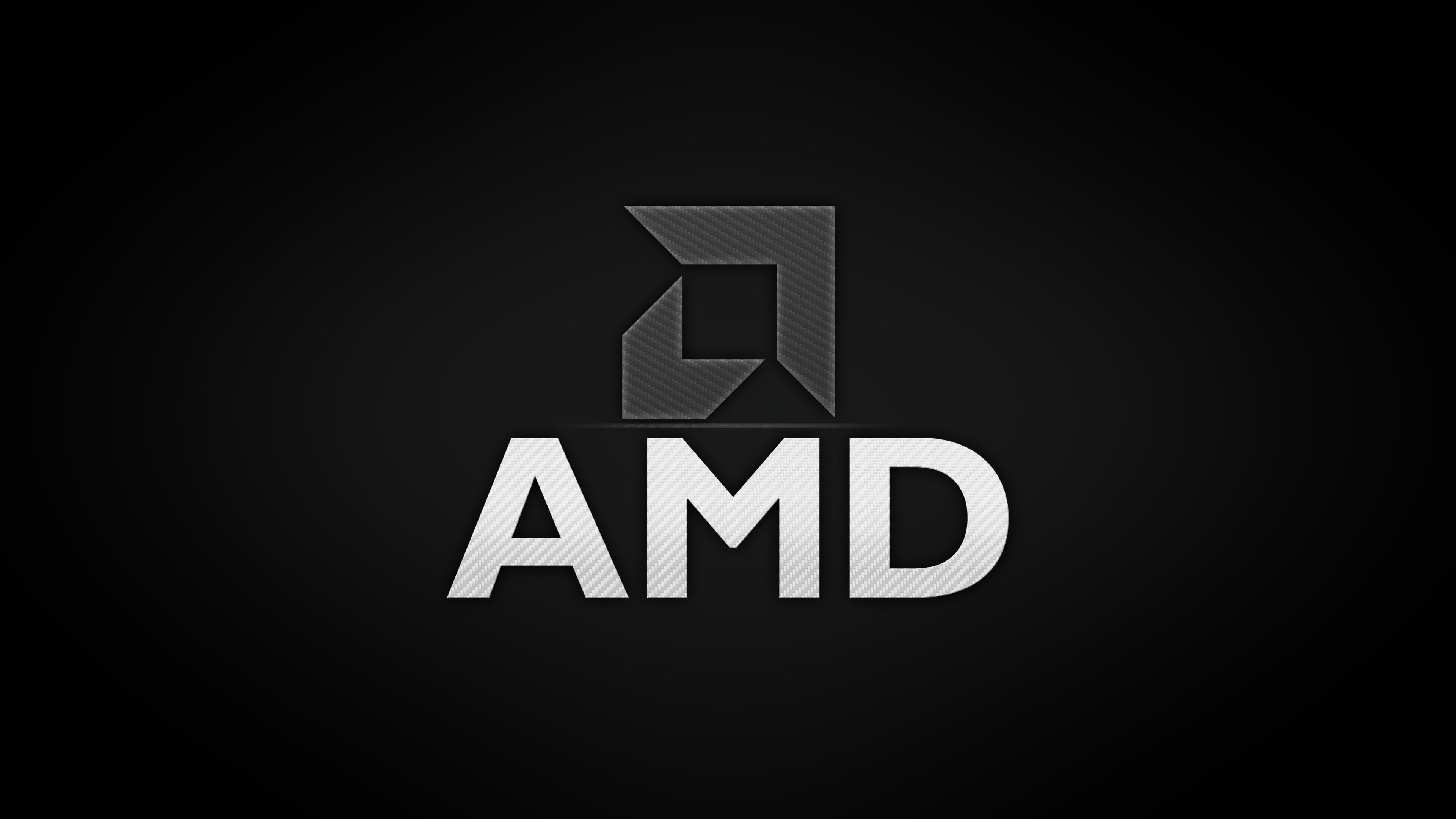 Бесплатное фото Логотип компании AMD и надписью AMD на темном фоне.