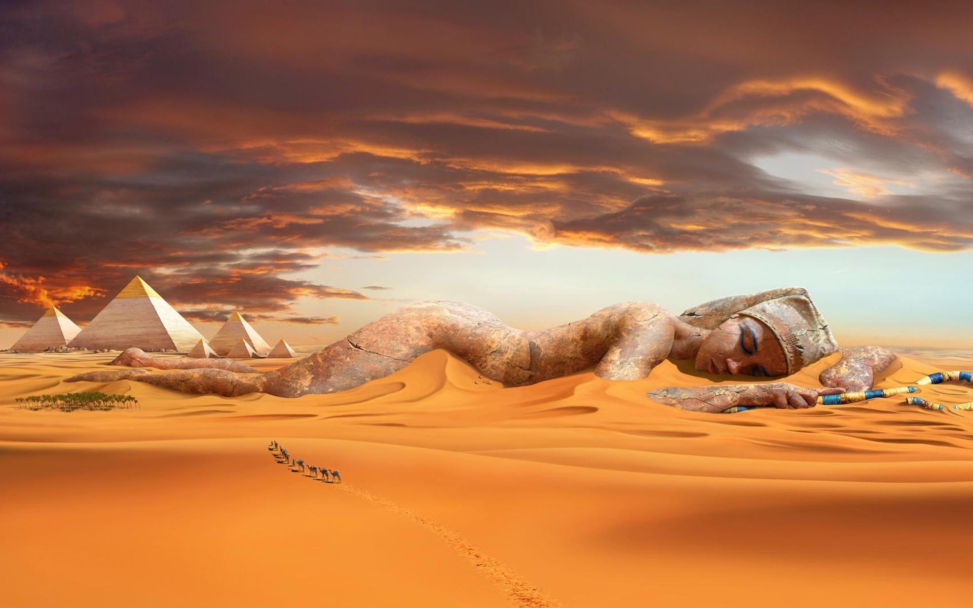 免费照片被沙子覆盖的埃及雕塑。