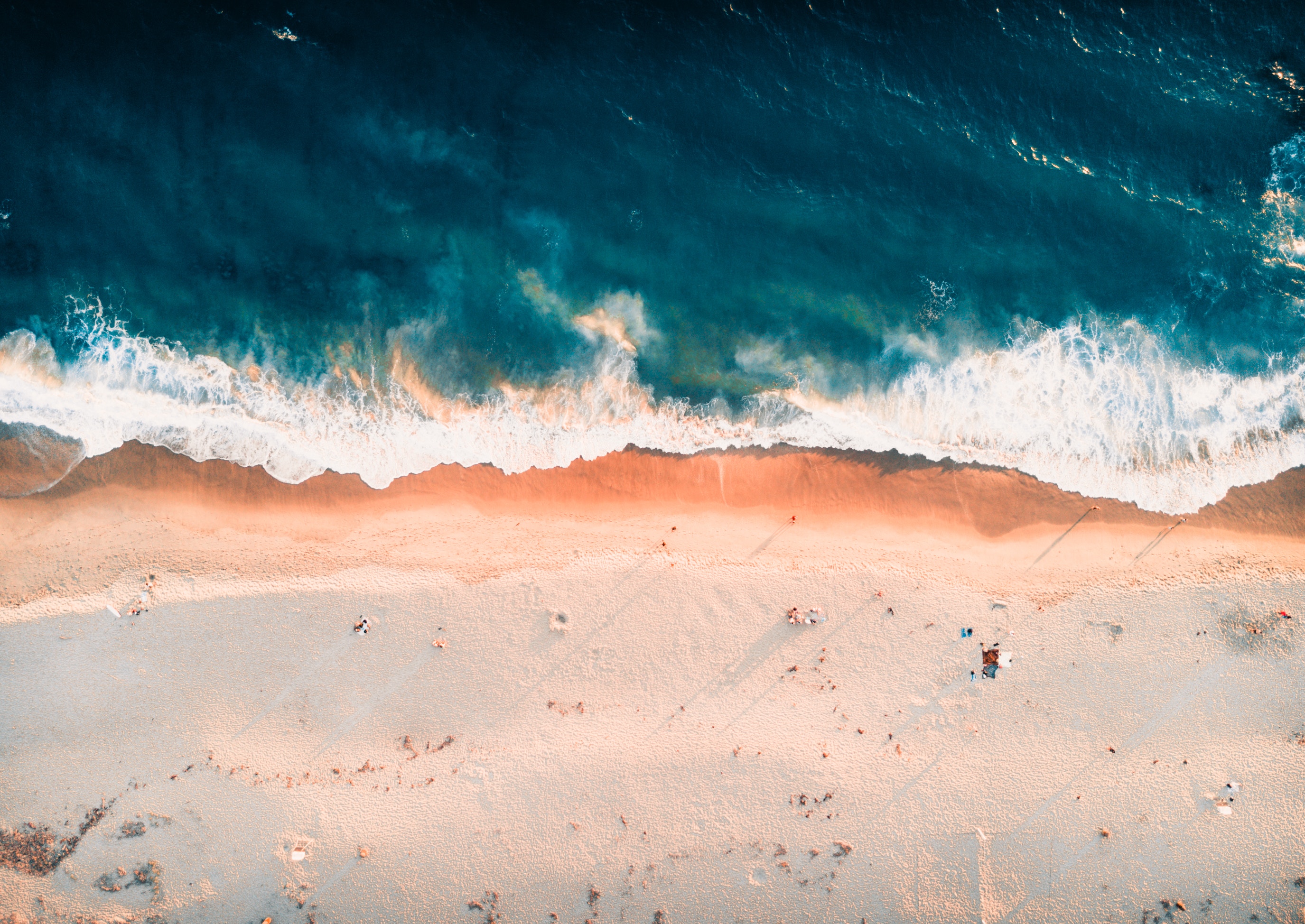 People relaxing on the beach of the sea