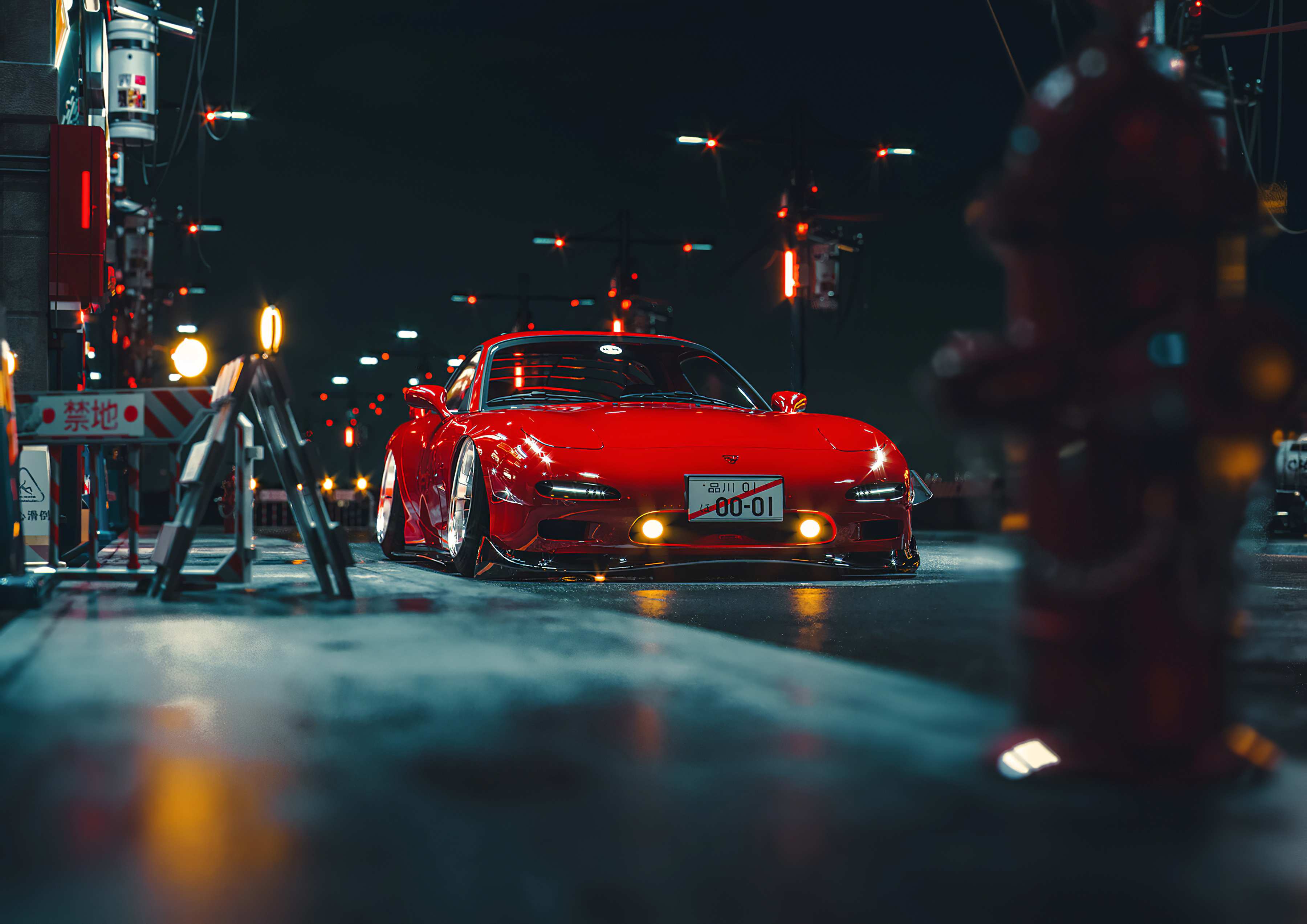 夜晚，一辆红色马自达 RX7 停在城市街道上。