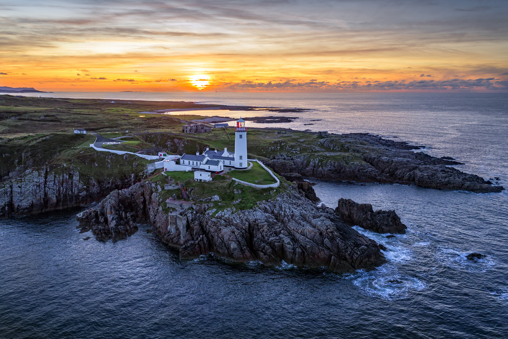 Wallpapers lighthouse rocks sunset on the desktop