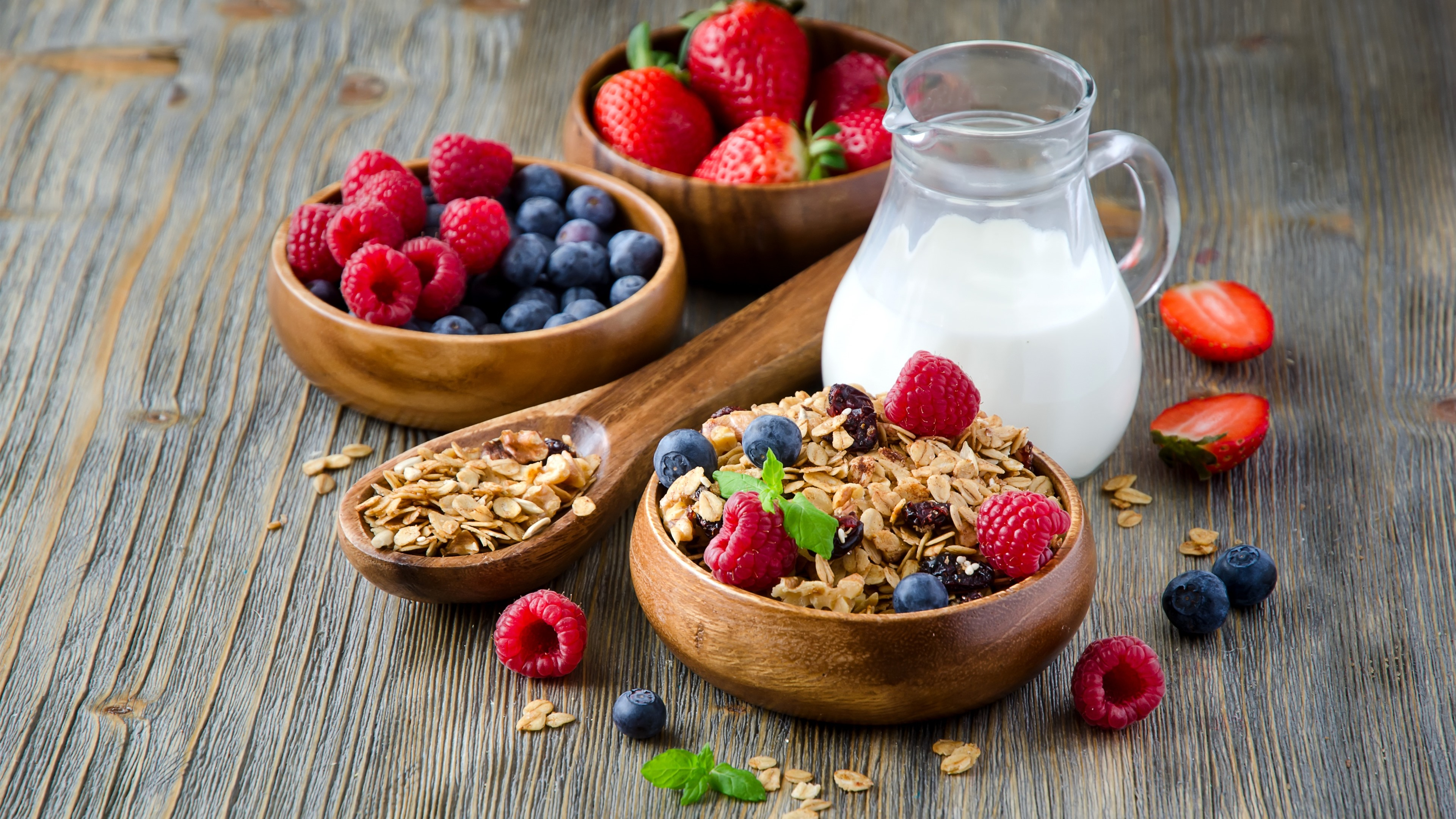 A still life of healthy food with milk and berries