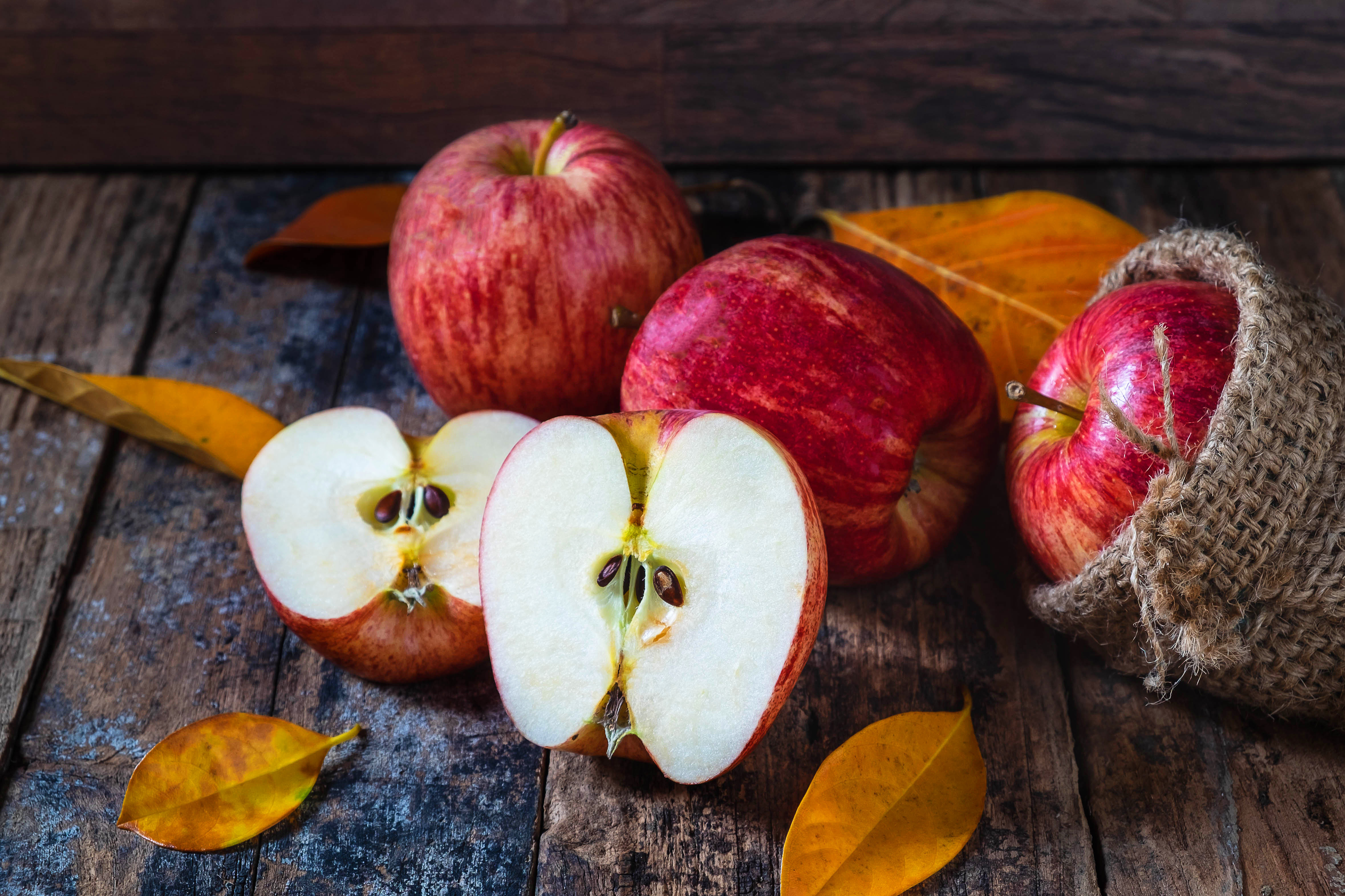 Free photo Halves of red apples