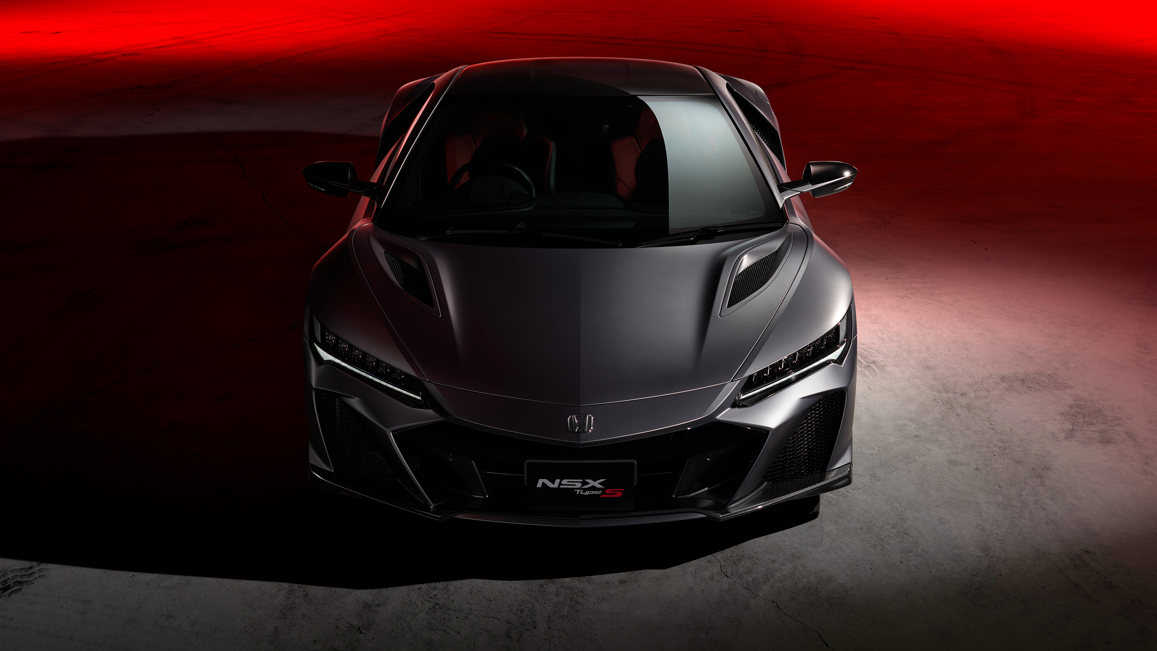 Free photo 2022 Honda NSX Type S in gray in dim light