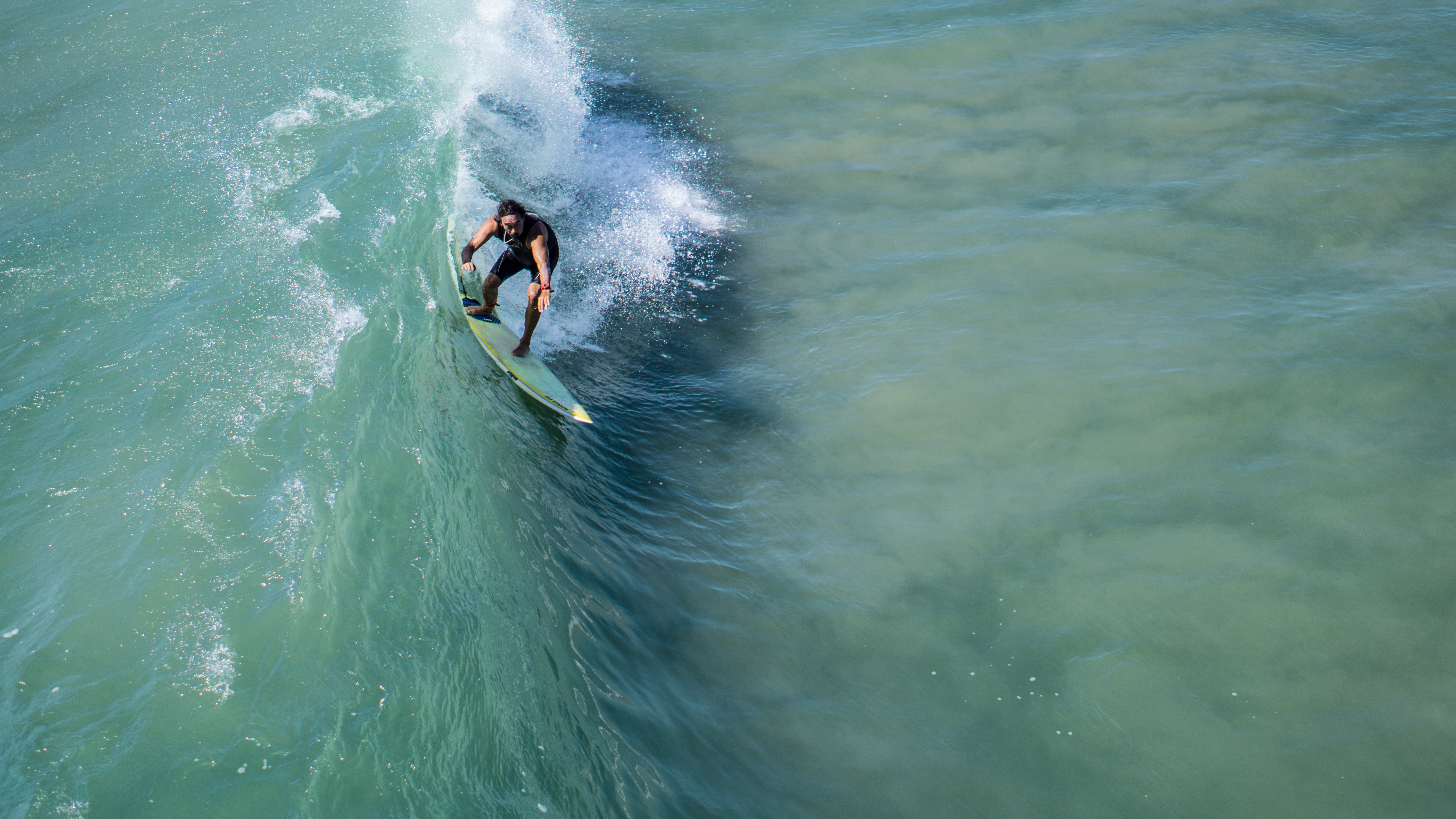 Free photo Surfer on a high wave