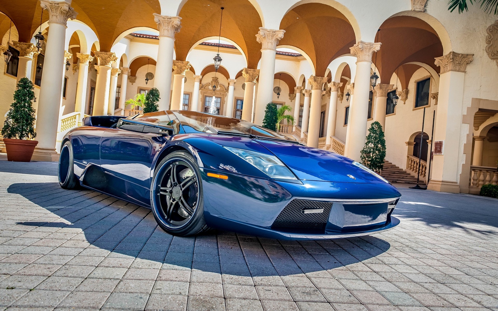A beautiful blue Lamborghini Aventador.