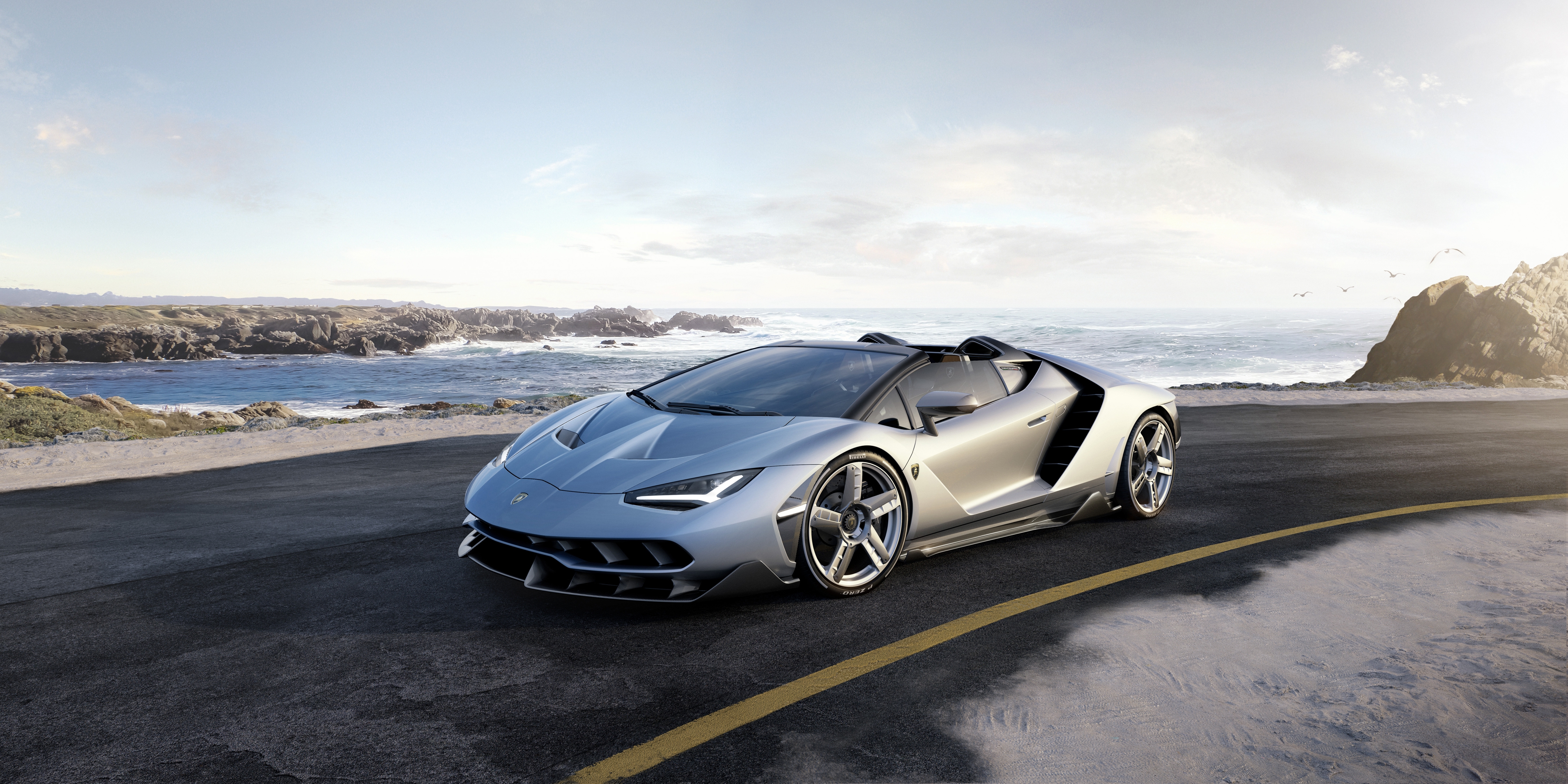 Free photo Lamborghini aventador roadster against the sea.