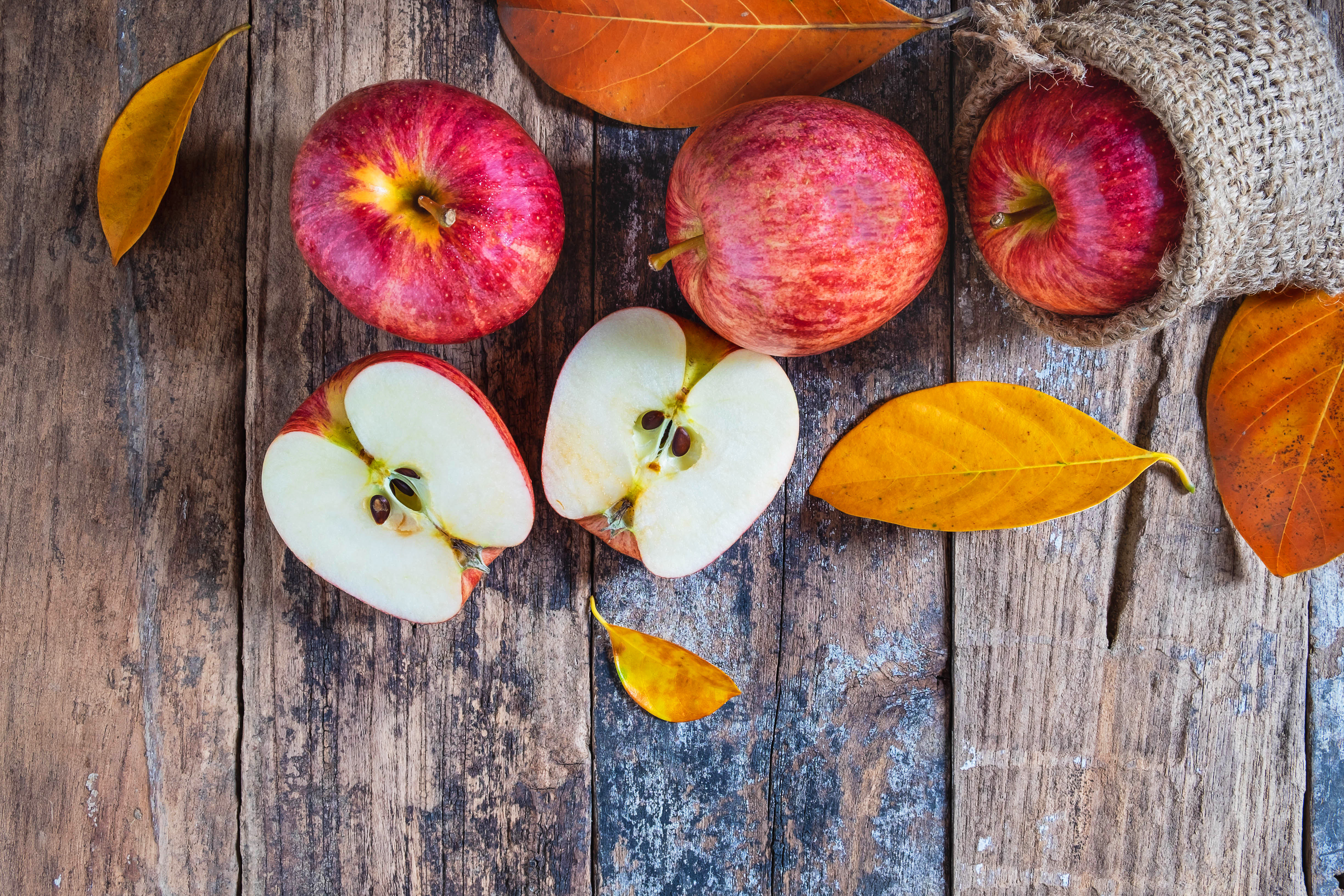 Free photo Apples and yellow leaves