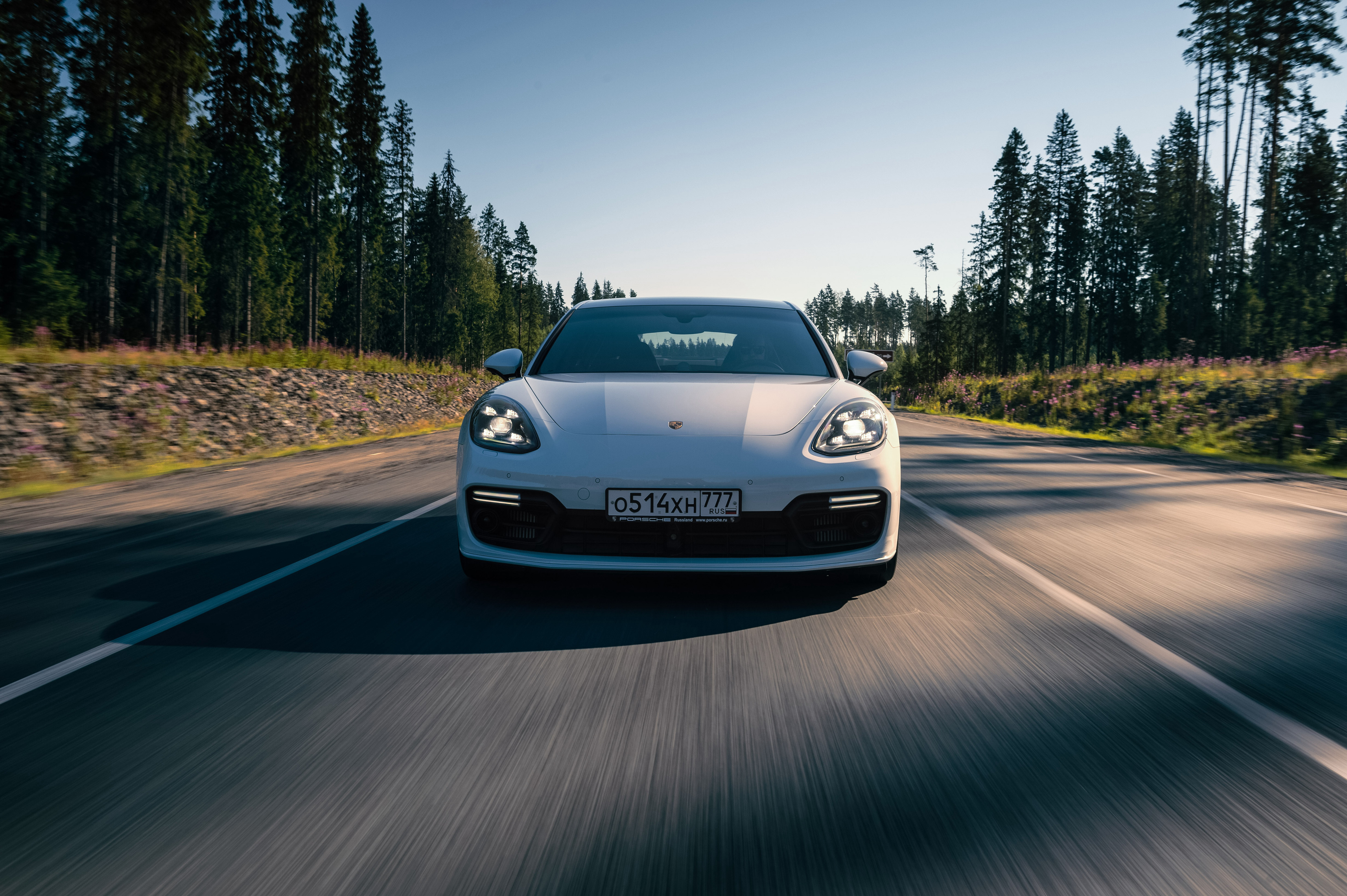 Wallpapers Porsche Panamera white car in move on the desktop