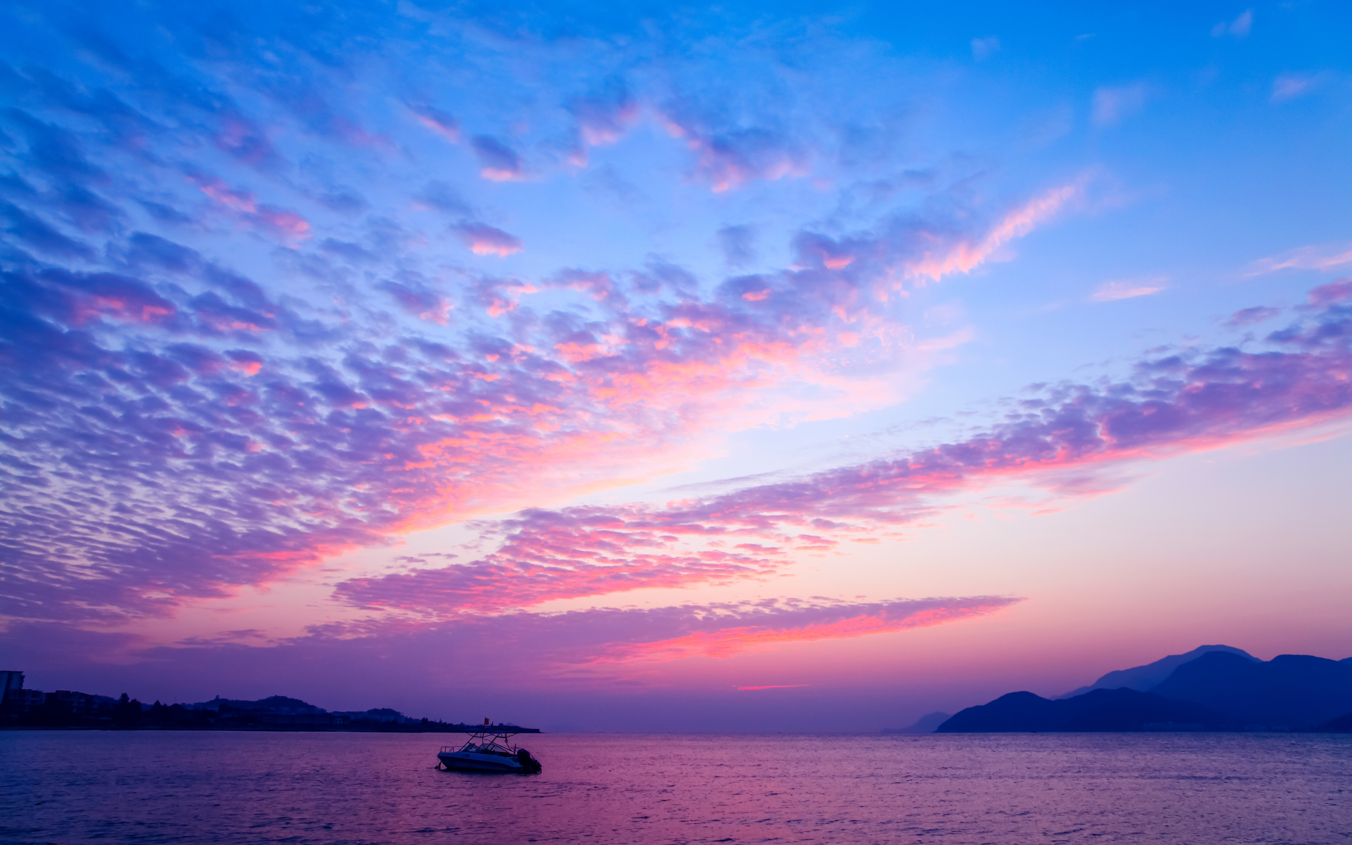 免费照片海面上娇艳的粉色夕阳