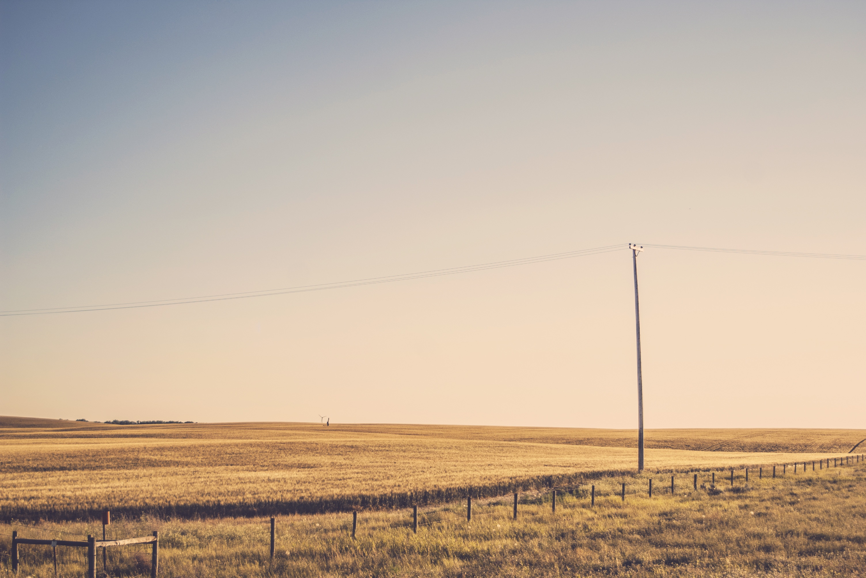 Free photo Rural area with passing electric wires