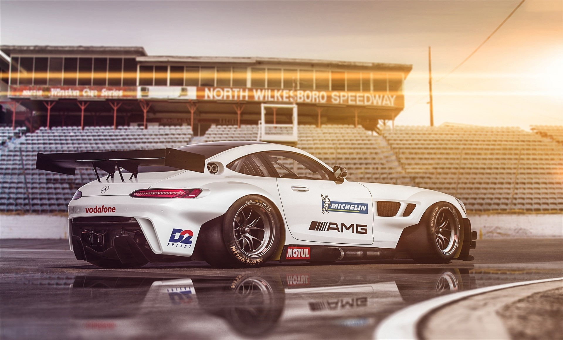 Free photo Mercedes AMG GT in white at sunset