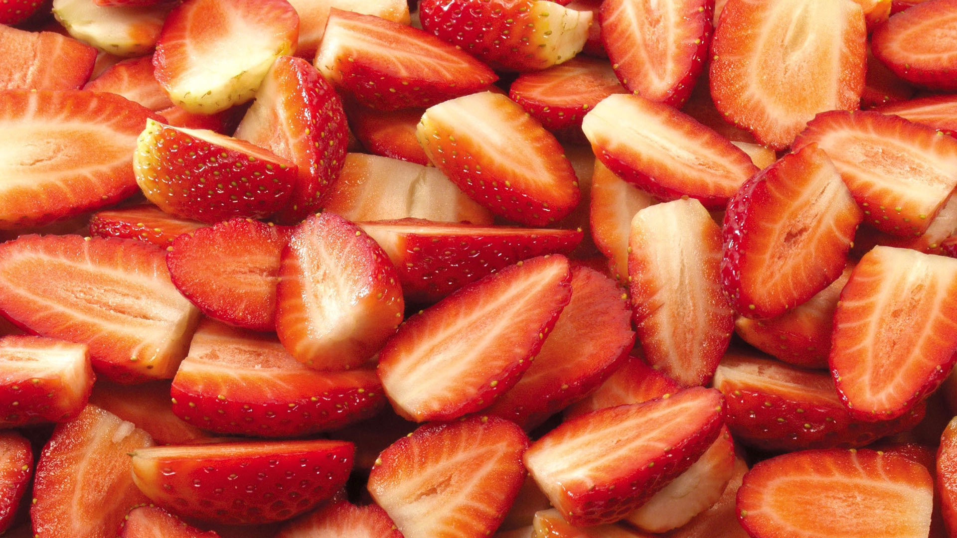 Sliced red strawberries
