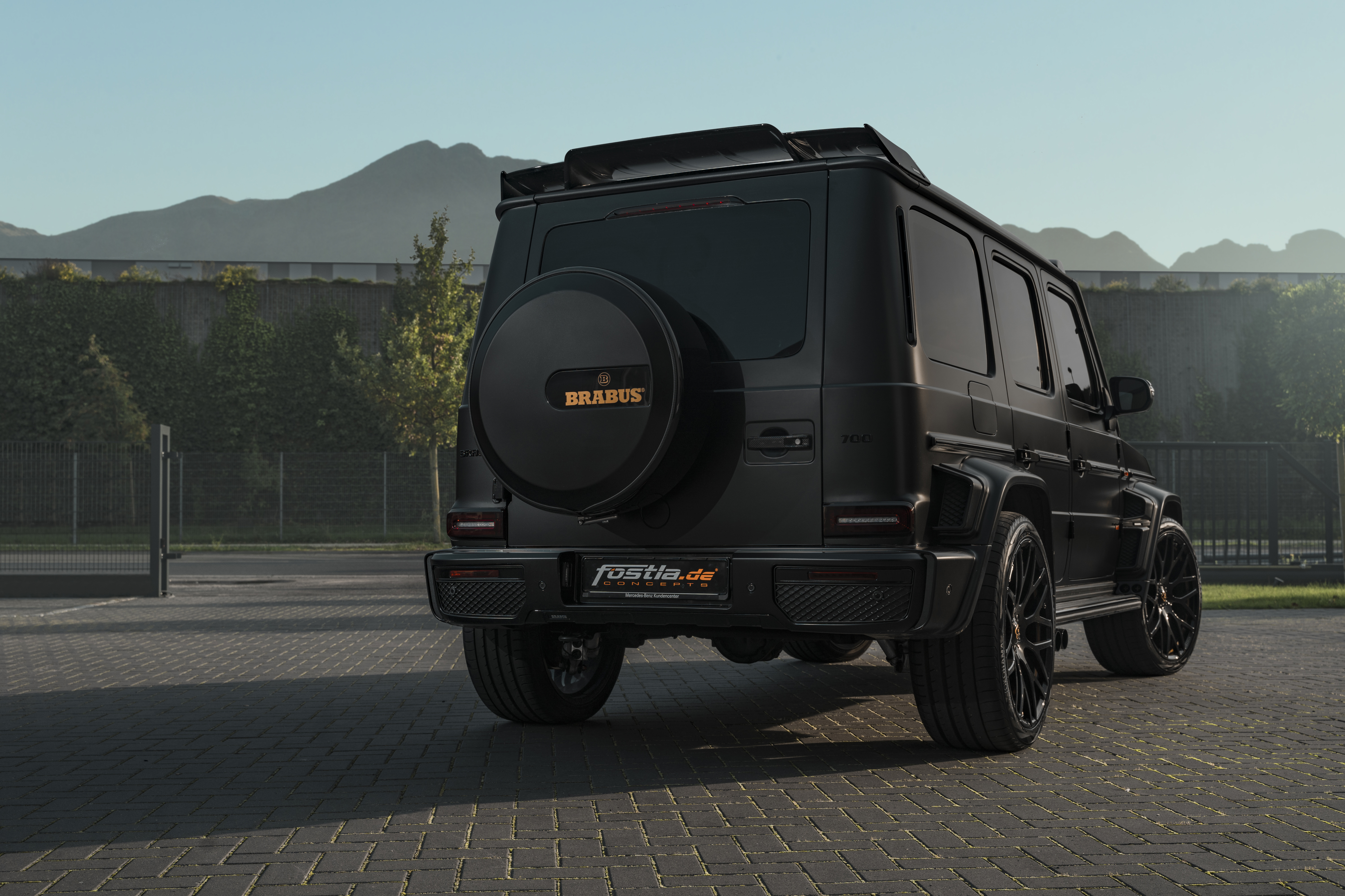 Free photo Matte black Mercedes G Class in Brabus body kit