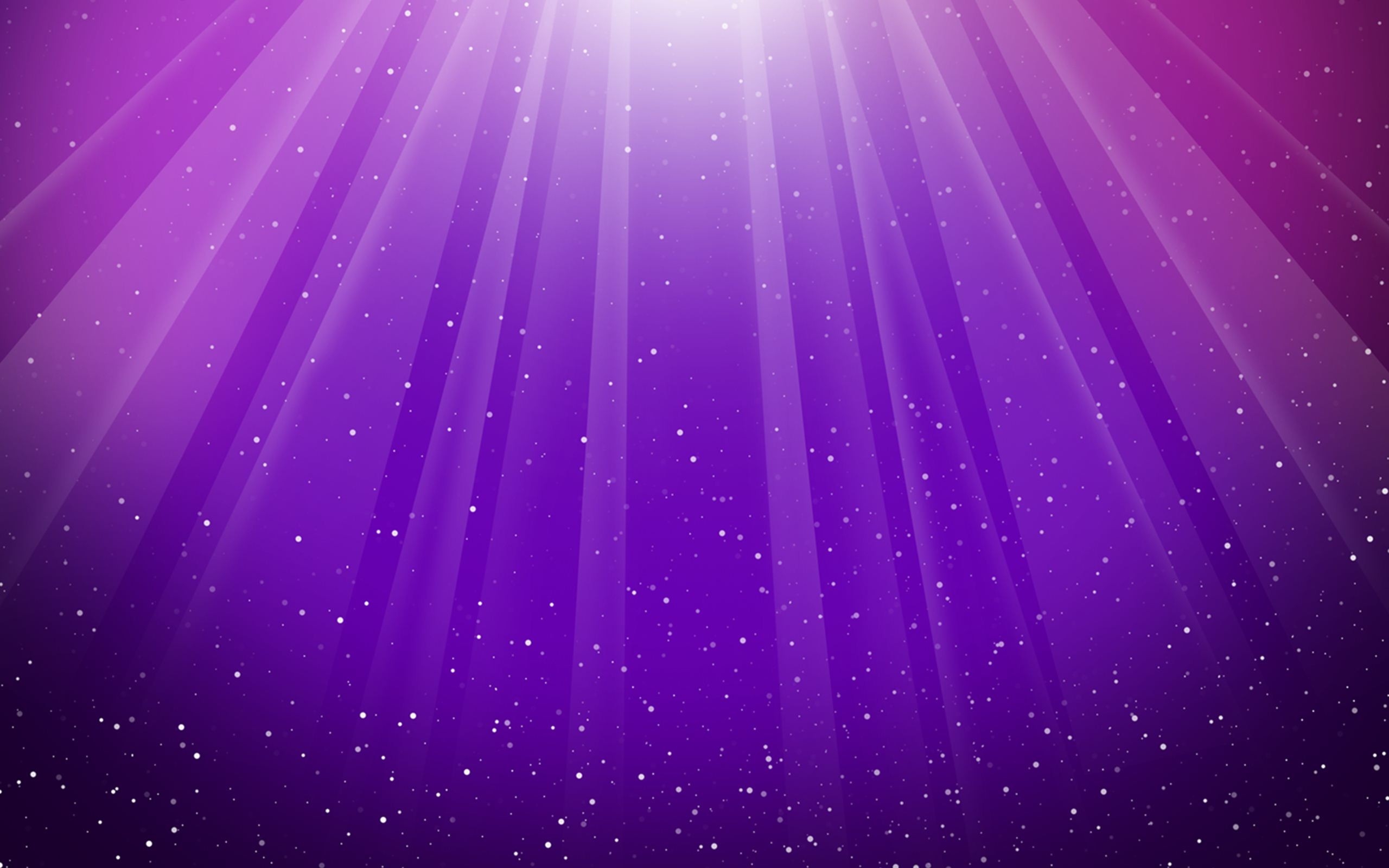 Rays of light with sparkles on a pink and purple background