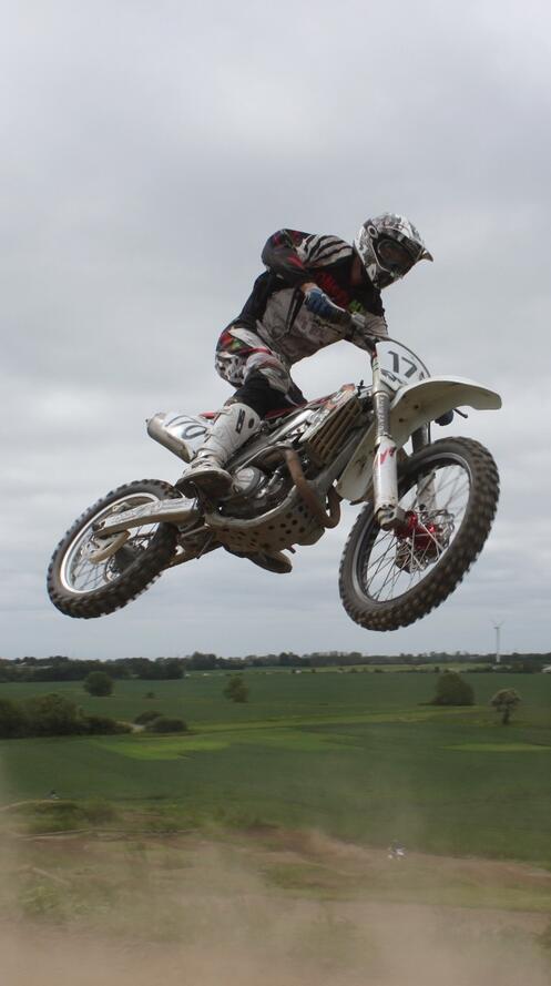 Free photo A cross bike in a jump