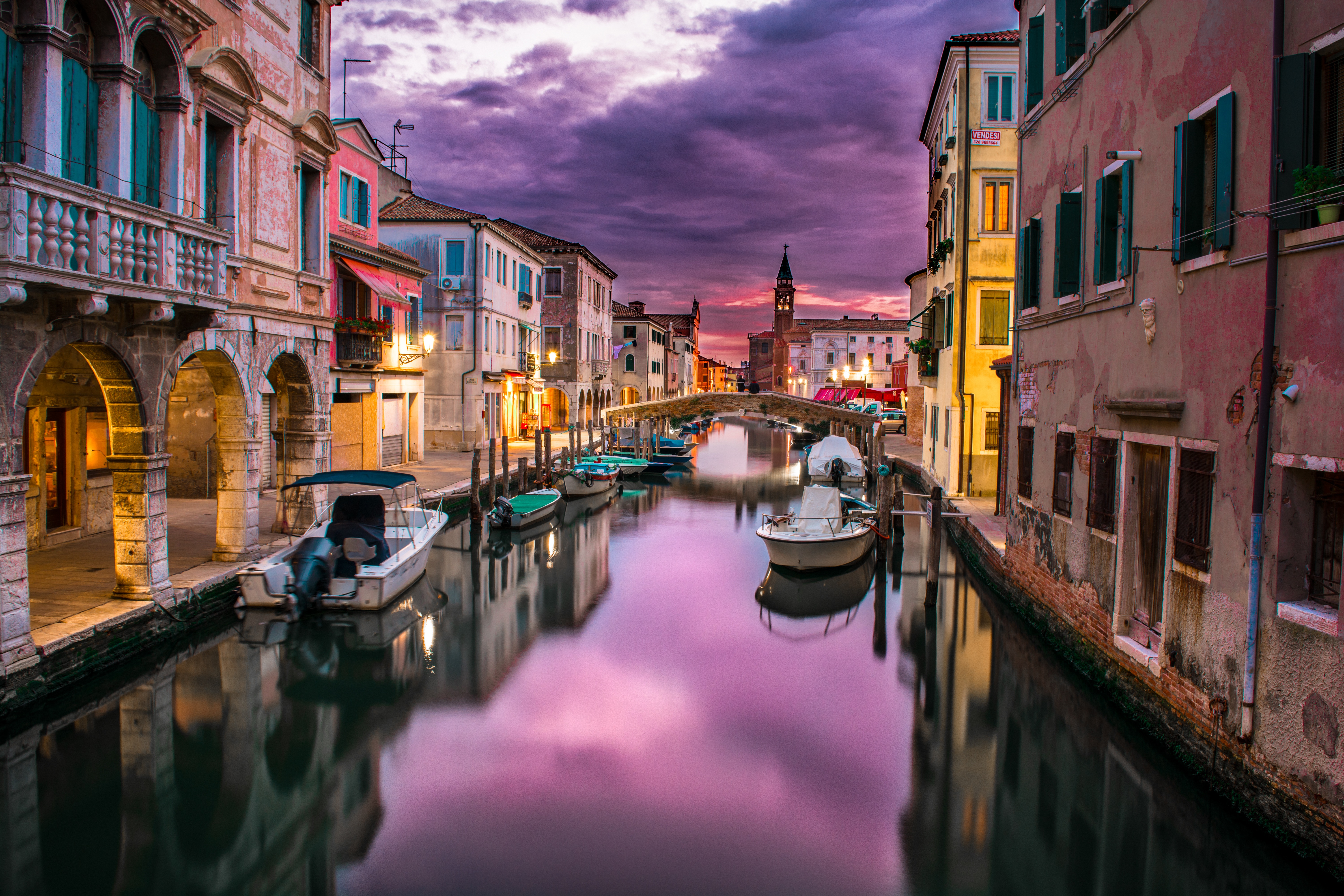 Free photo Waterworks among the houses at sunset