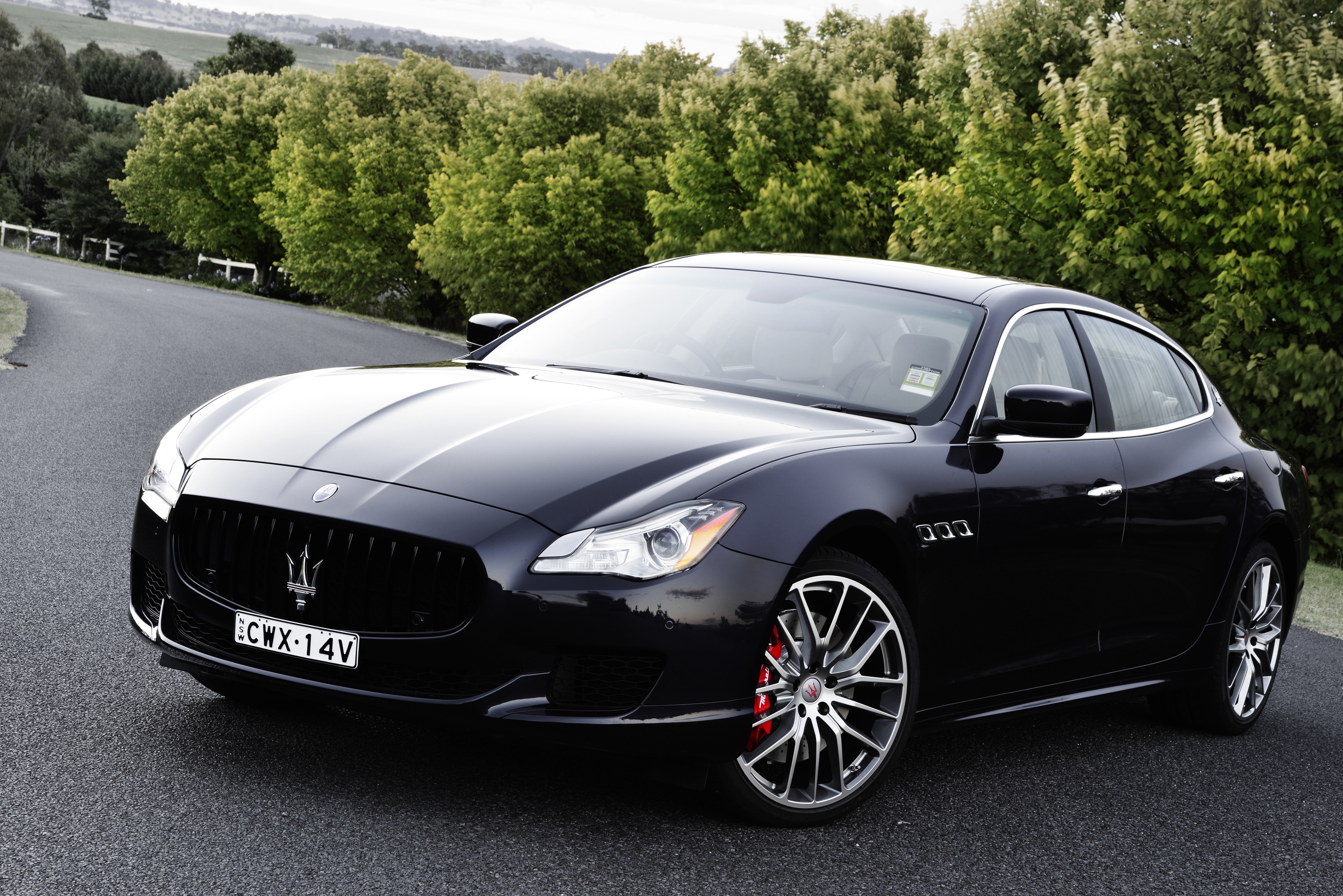 Wallpapers Maserati Quattroporte GTS black road forest on the desktop