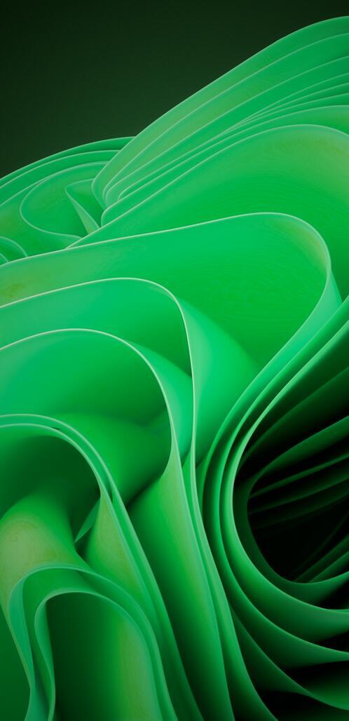 Бесплатное фото Зеленые волны на темном фоне