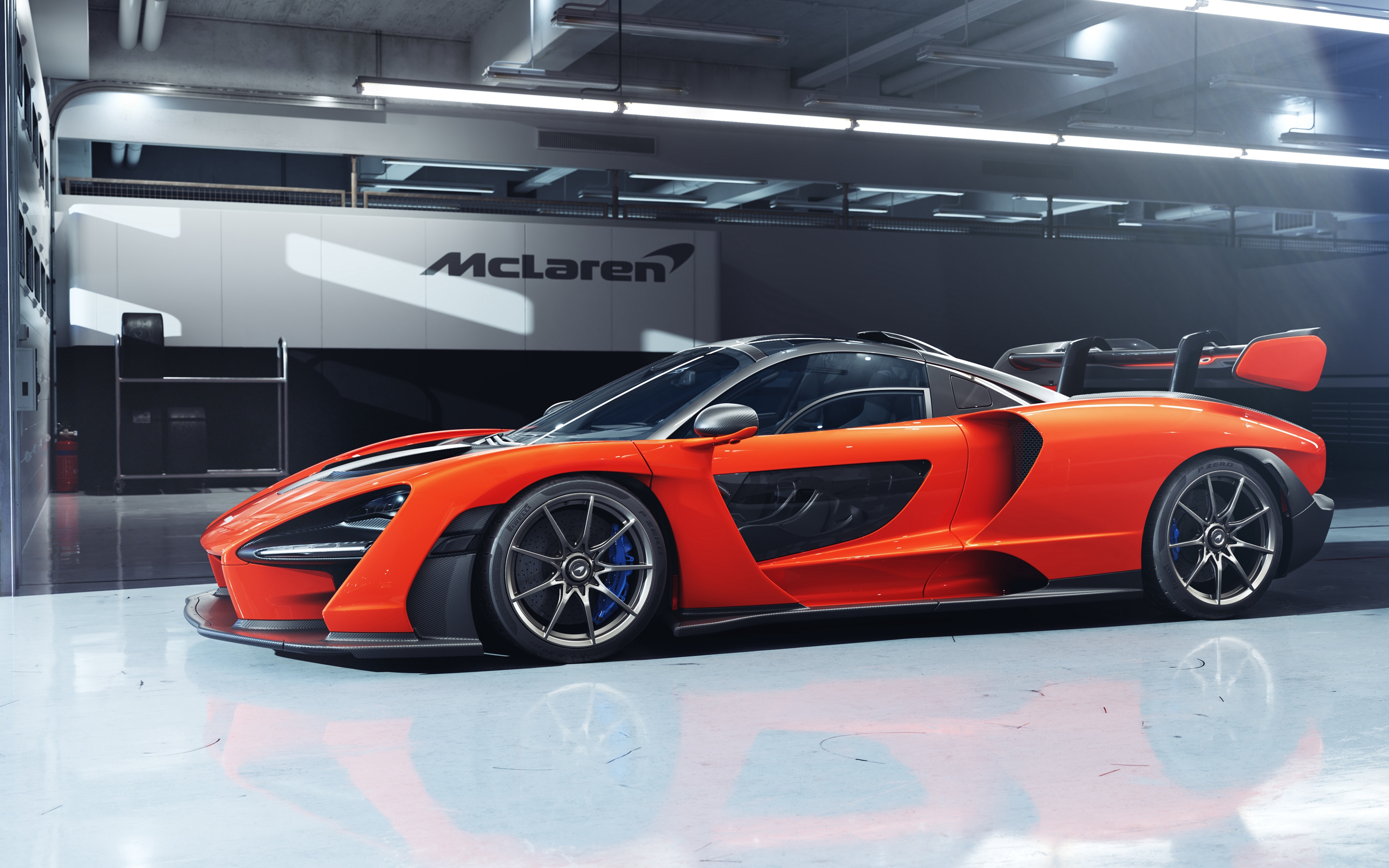 Free photo Orange supercar mclaren senna 2019 side view