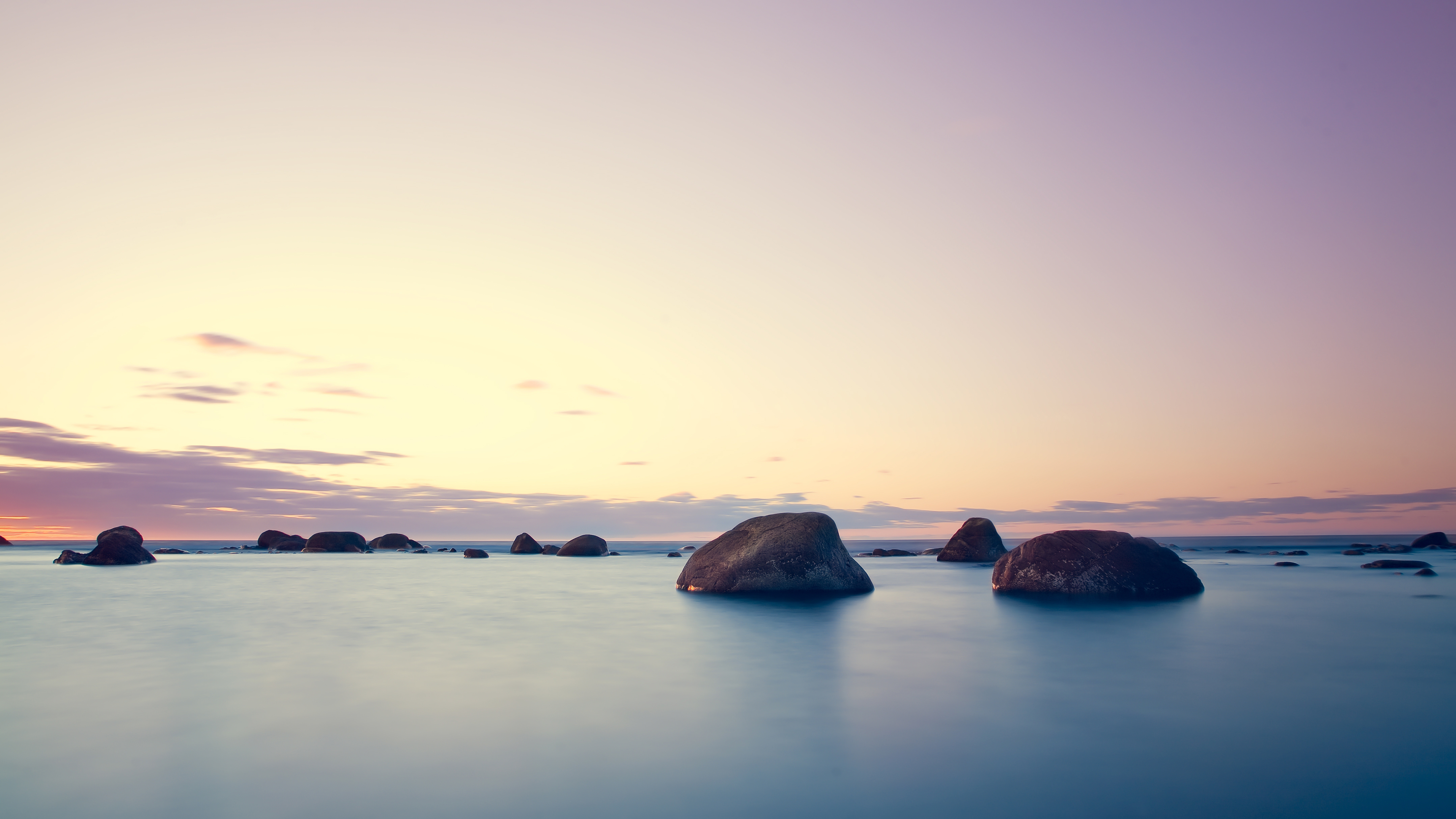 Free photo A tranquil landscape by the ocean at sunset