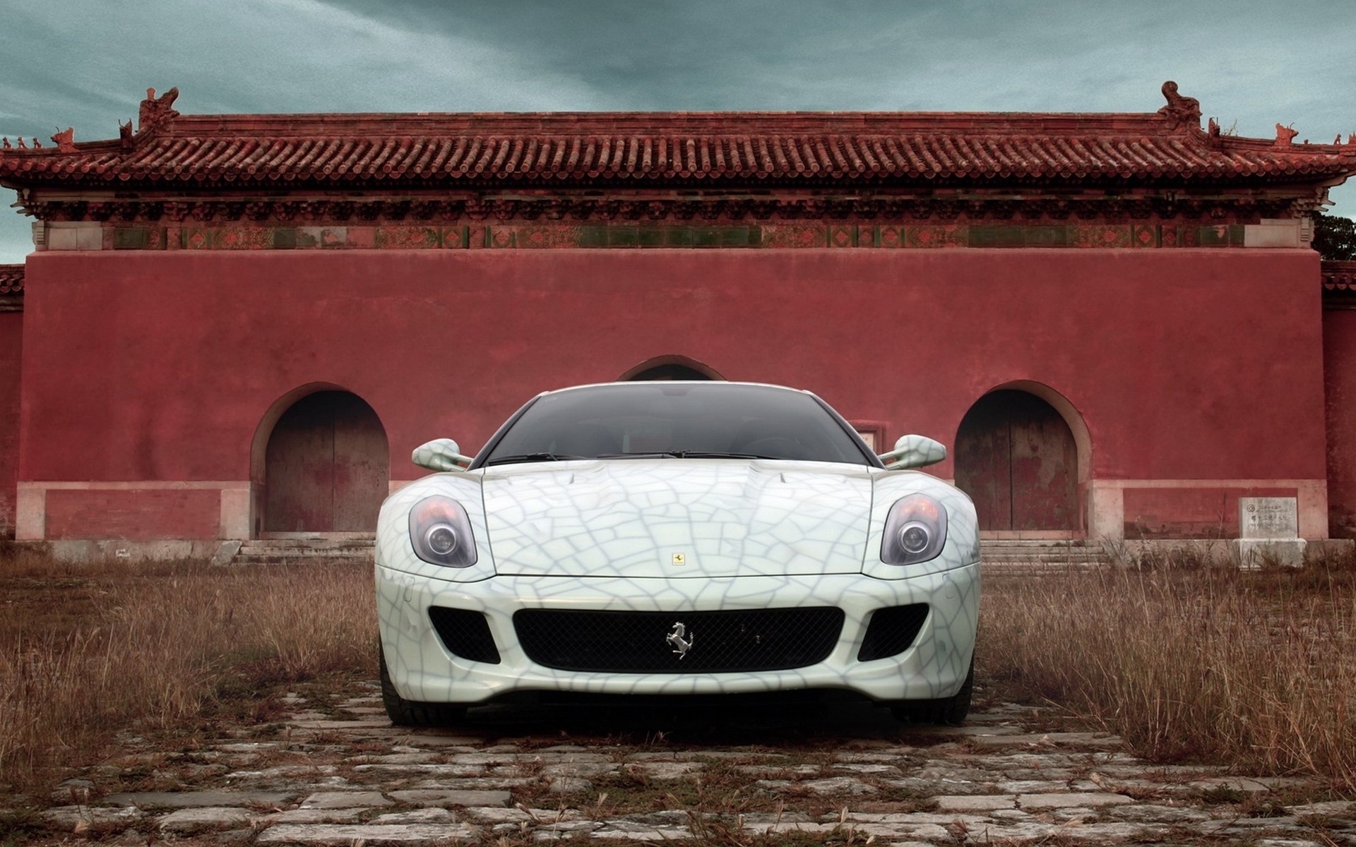 Wallpapers sports car grass building on the desktop