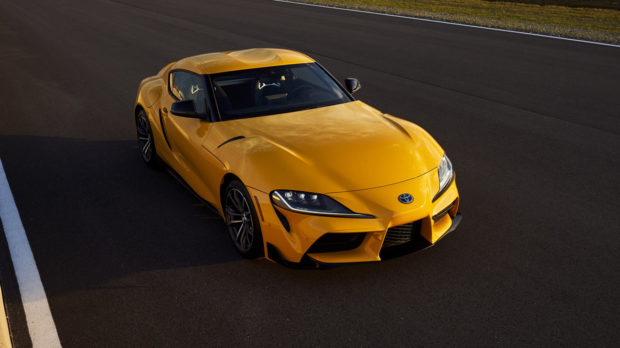 Free photo Yellow Toyota Supra 2021.