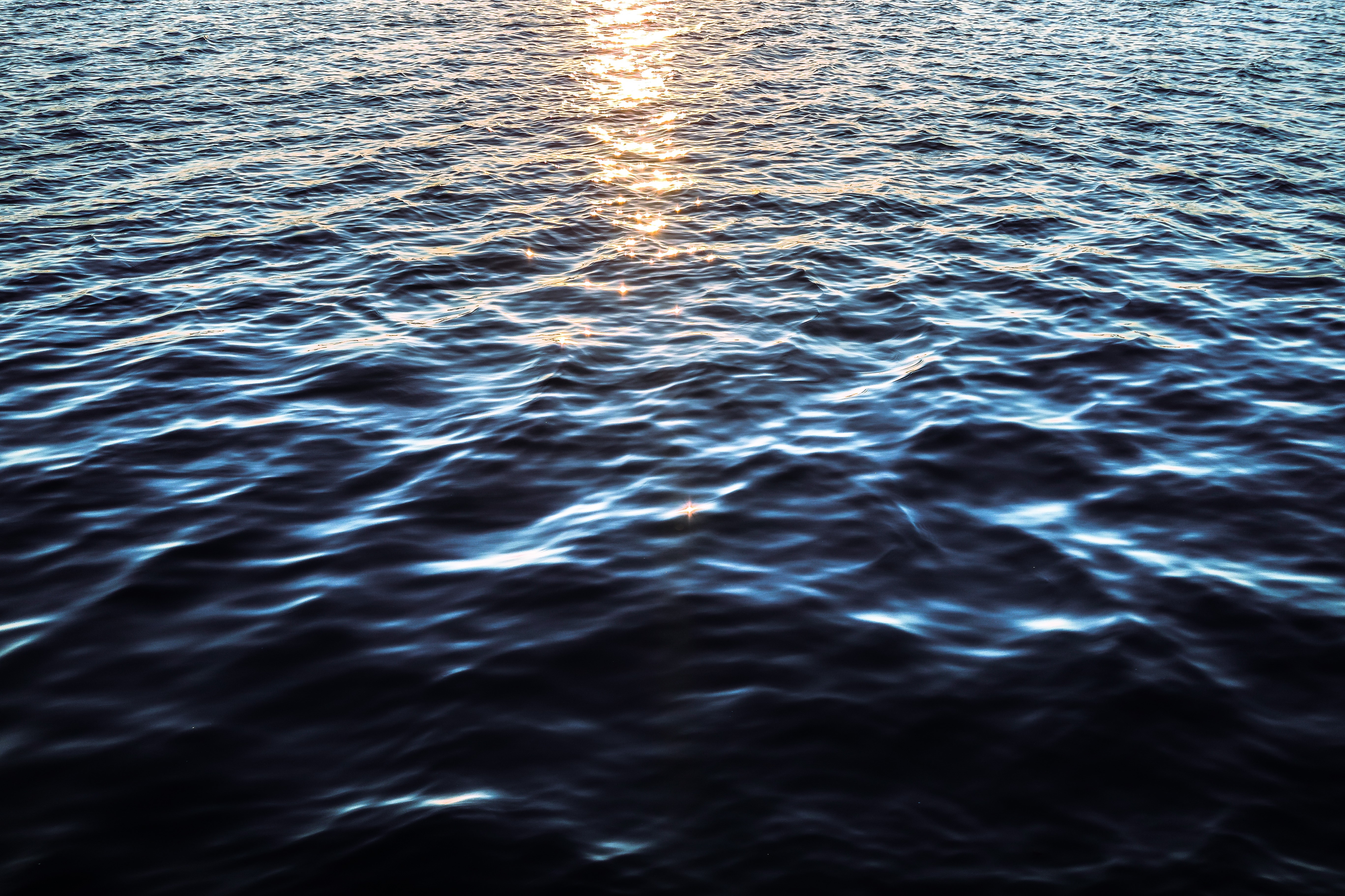 The sun reflects on the sea surface