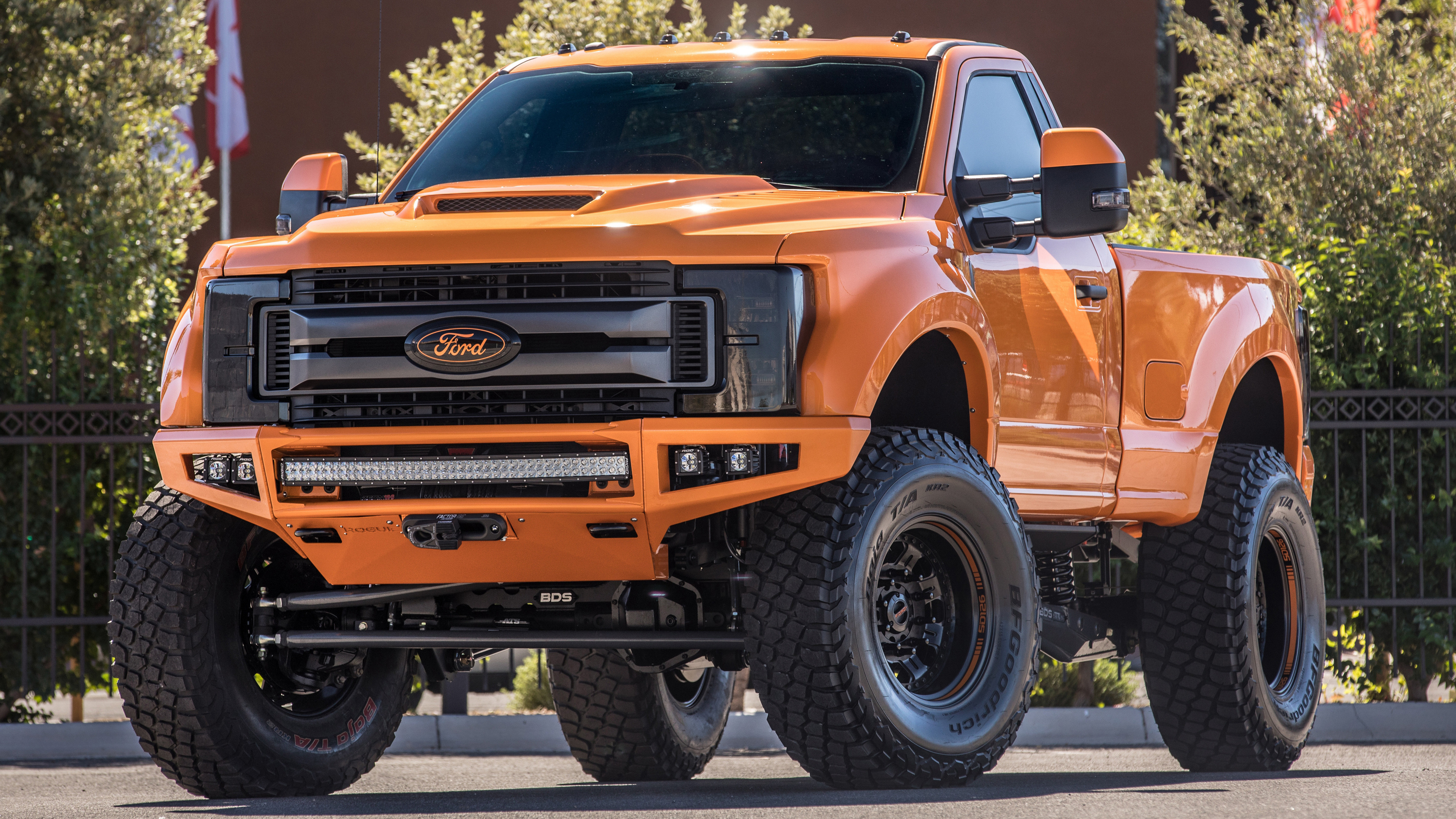 Free photo Ford Super Duty in orange on big wheels