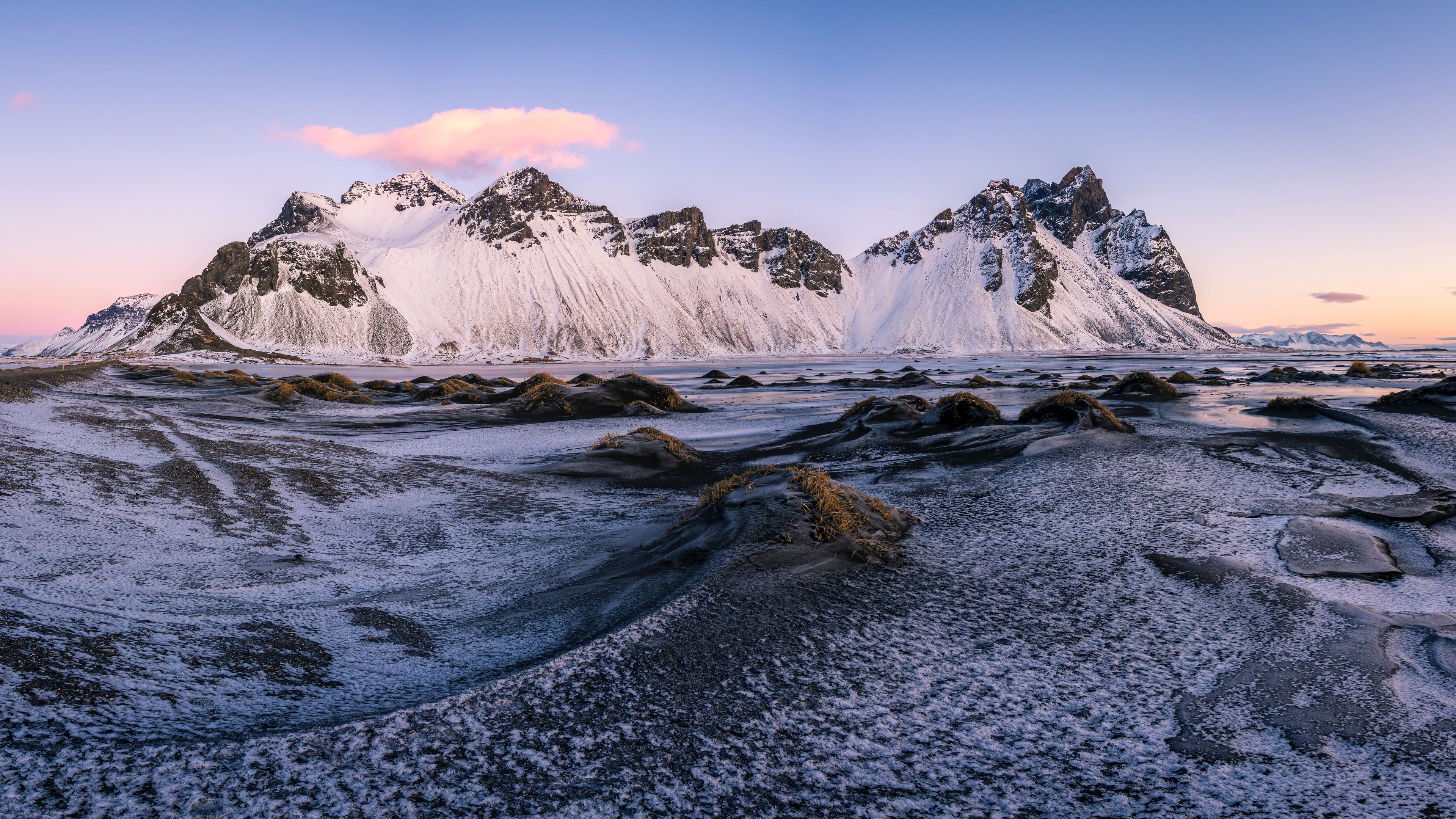 First snow appears off the coast of vestrahorn