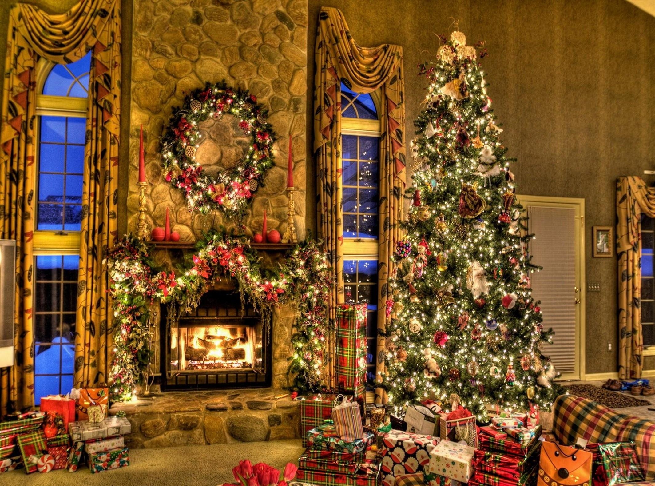 Free photo Big pile of presents under the Christmas tree.