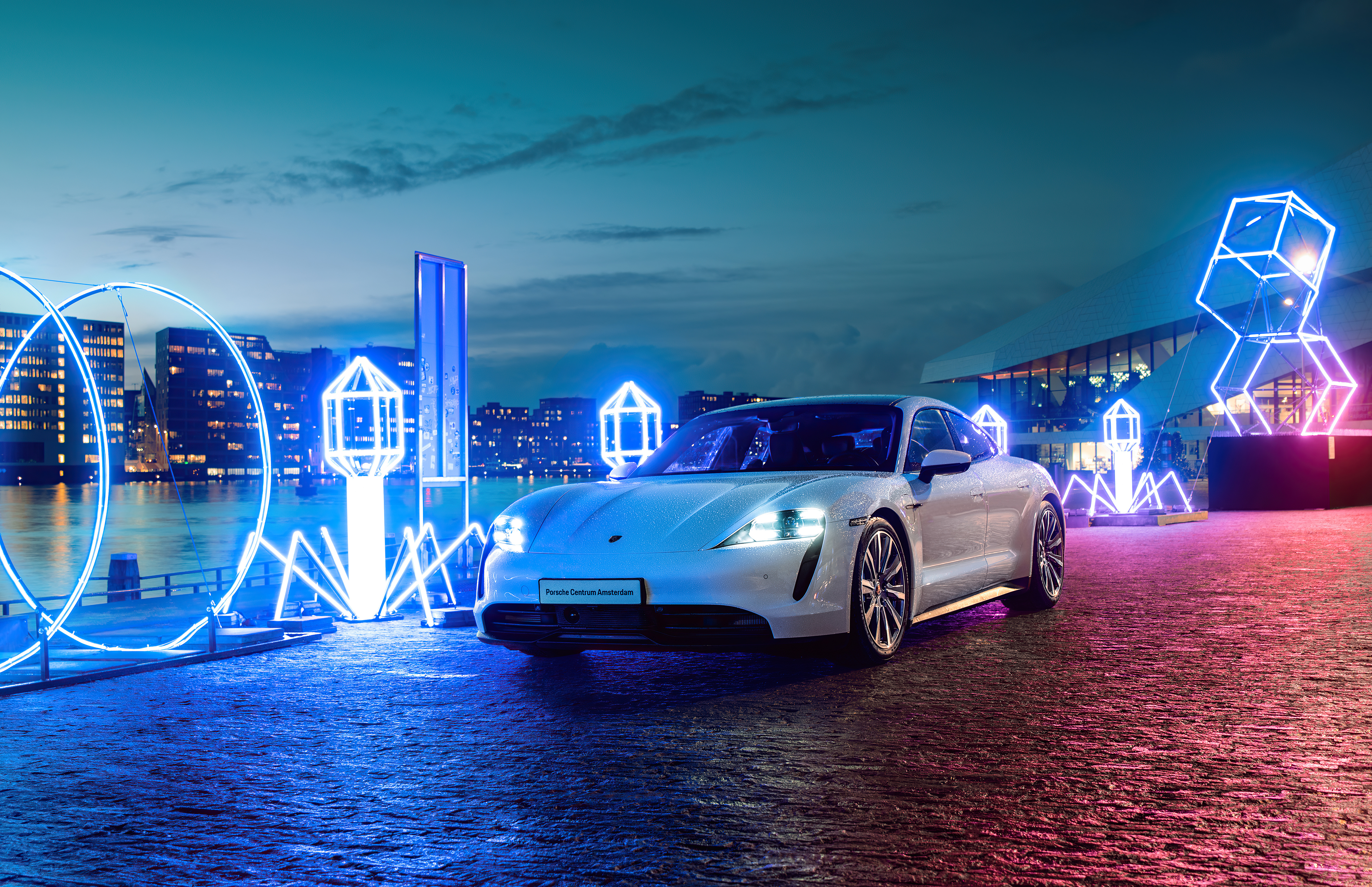 Free photo Porsche Taycan Turbo S on the beach