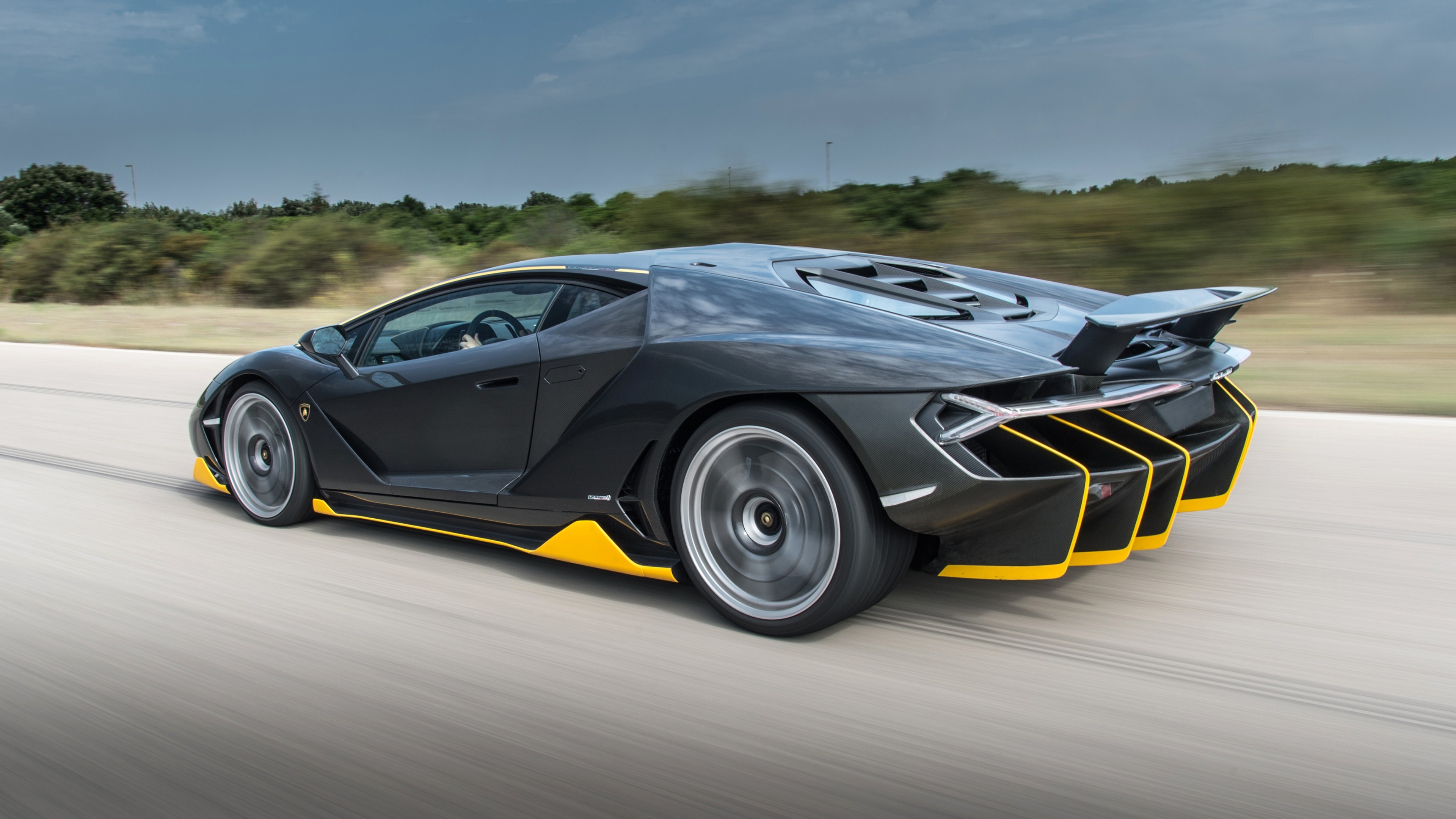 Free photo Lamborghini Aventador going at high speed.