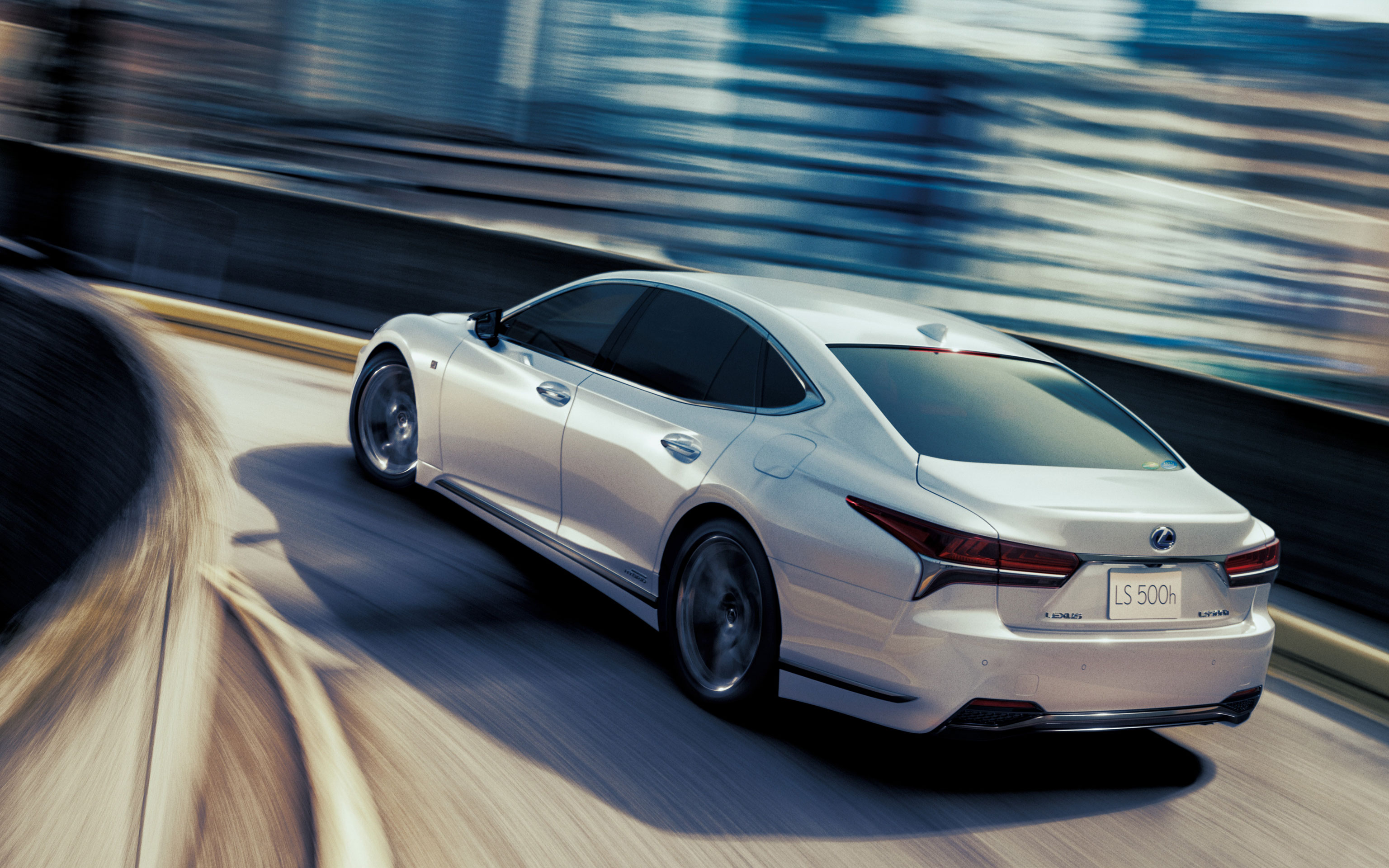 Free photo Lexus ls 500h f sport goes into a corner.