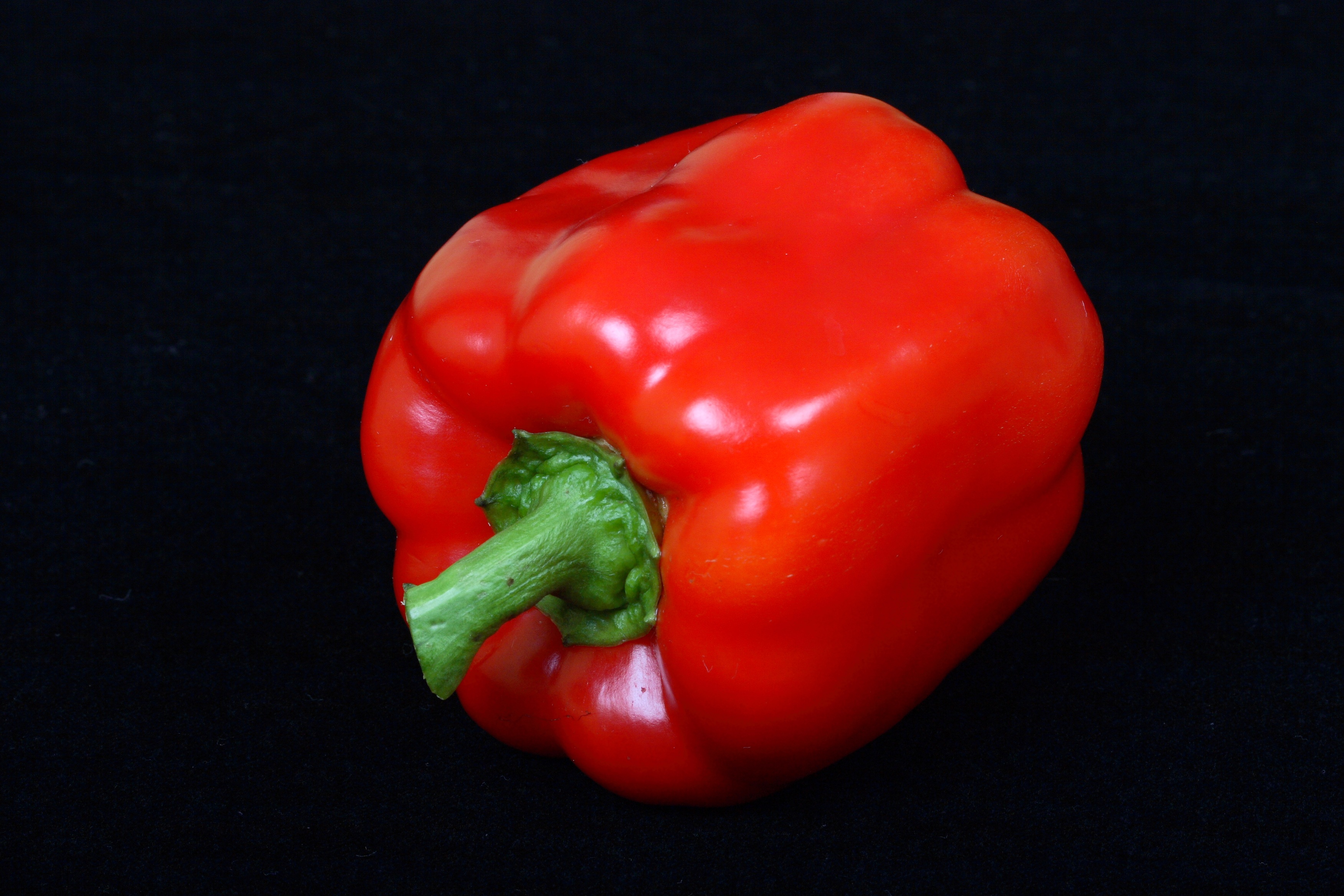 Free photo Red pepper on a black background