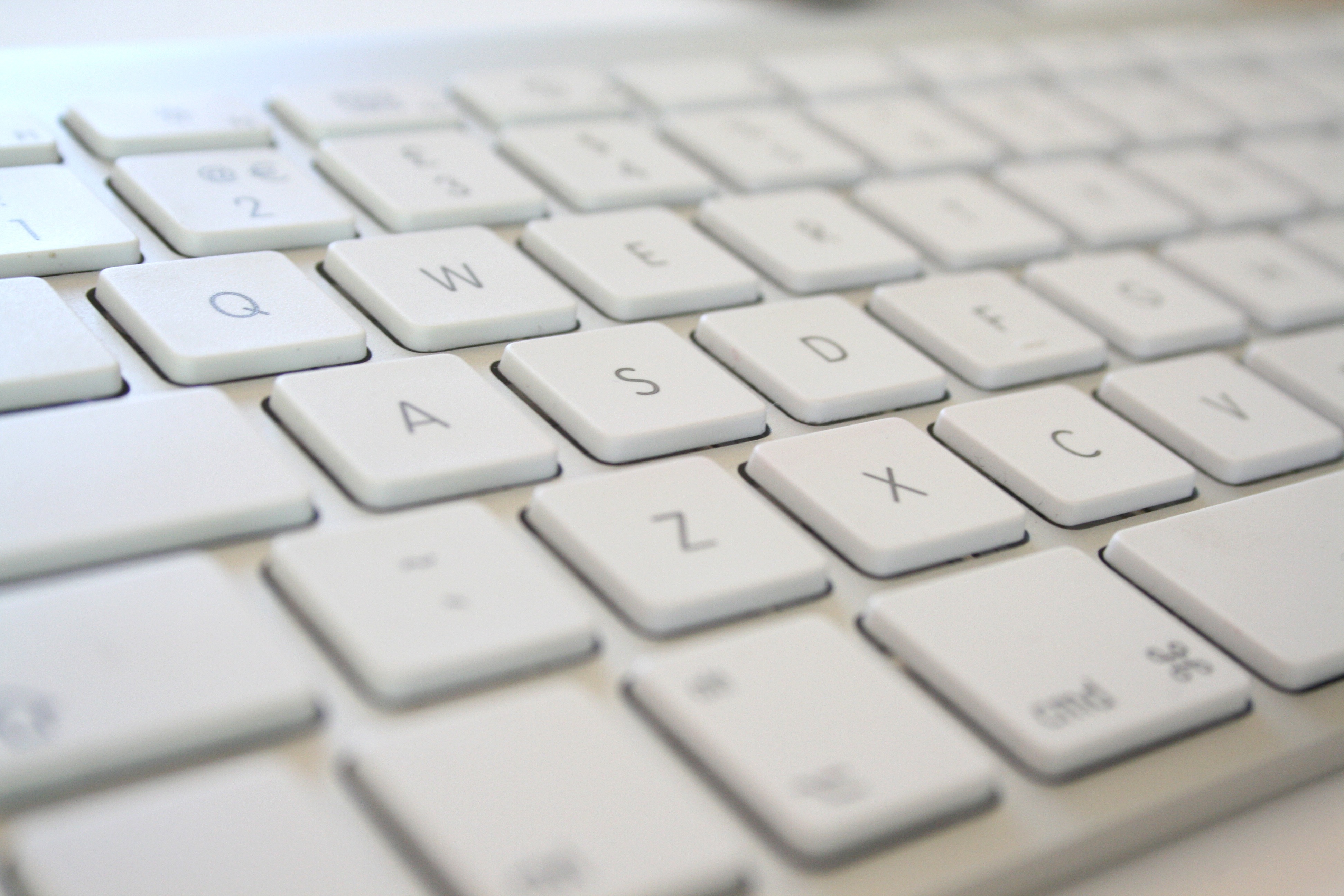 Free photo Close-up of the white keypad buttons in white