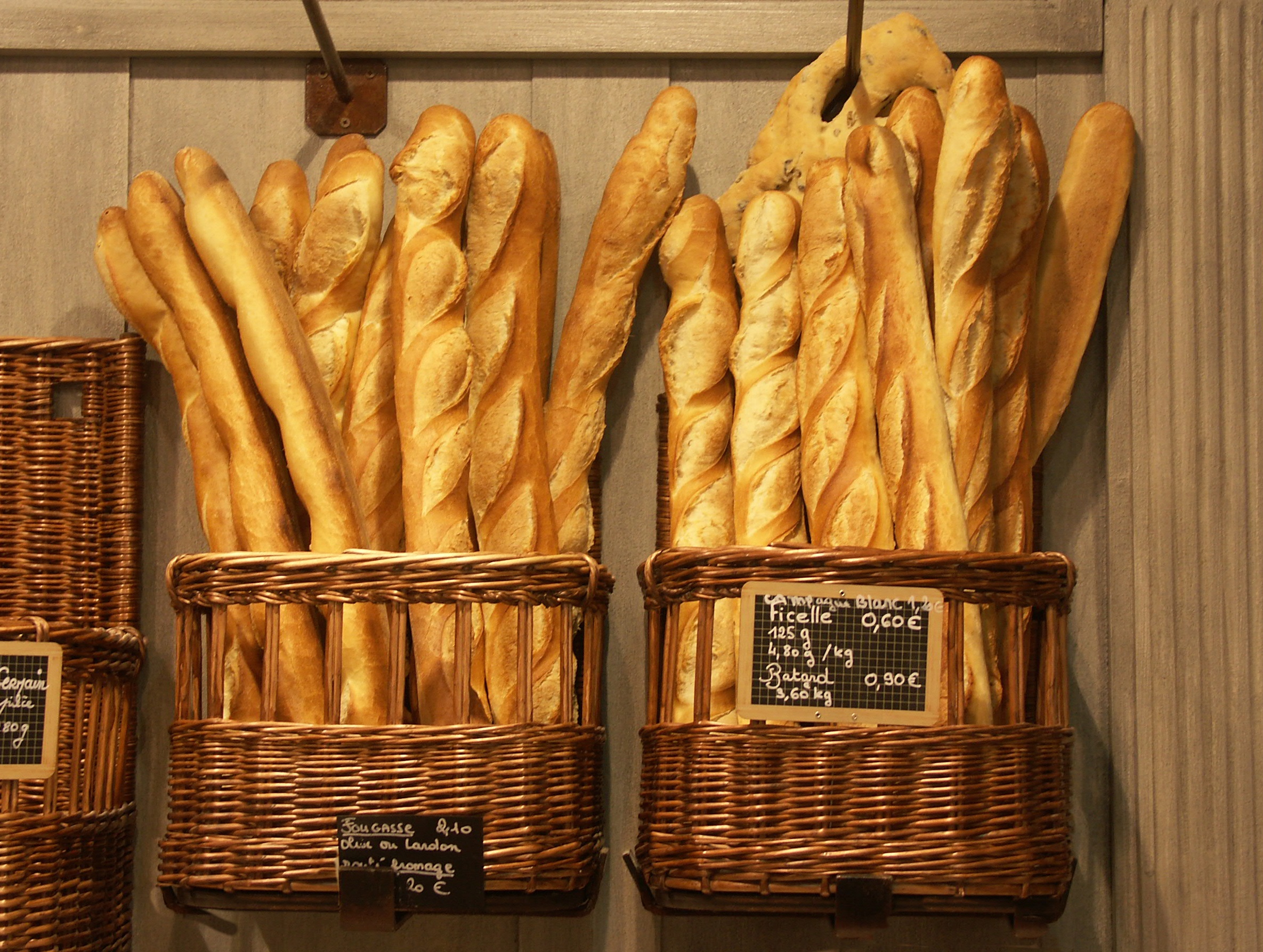 Baguette from France, gold-tinted, in wicker baskets.